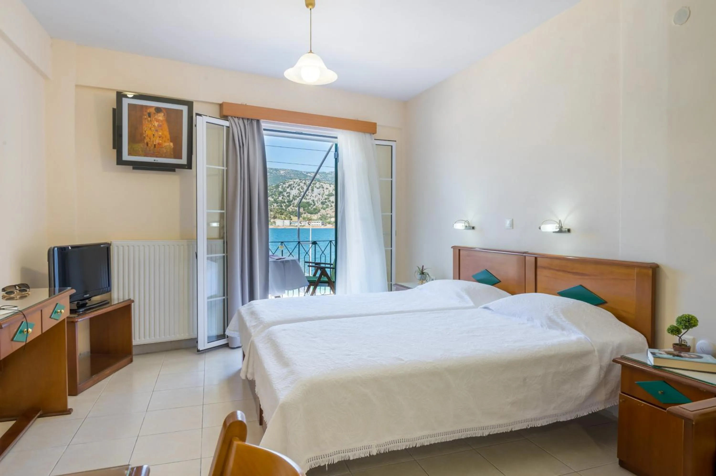 Bed in Rouchotas Apartments