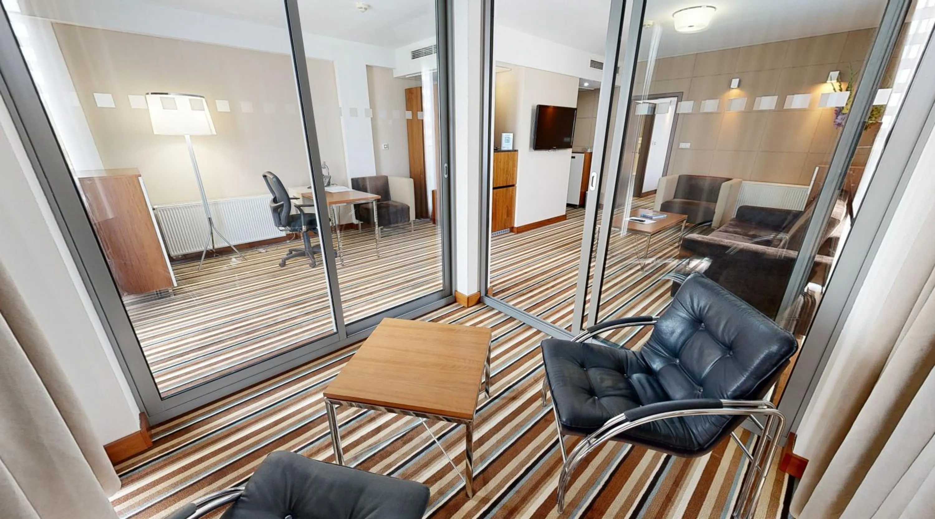 Seating area in Business Hotel Astrum Laus