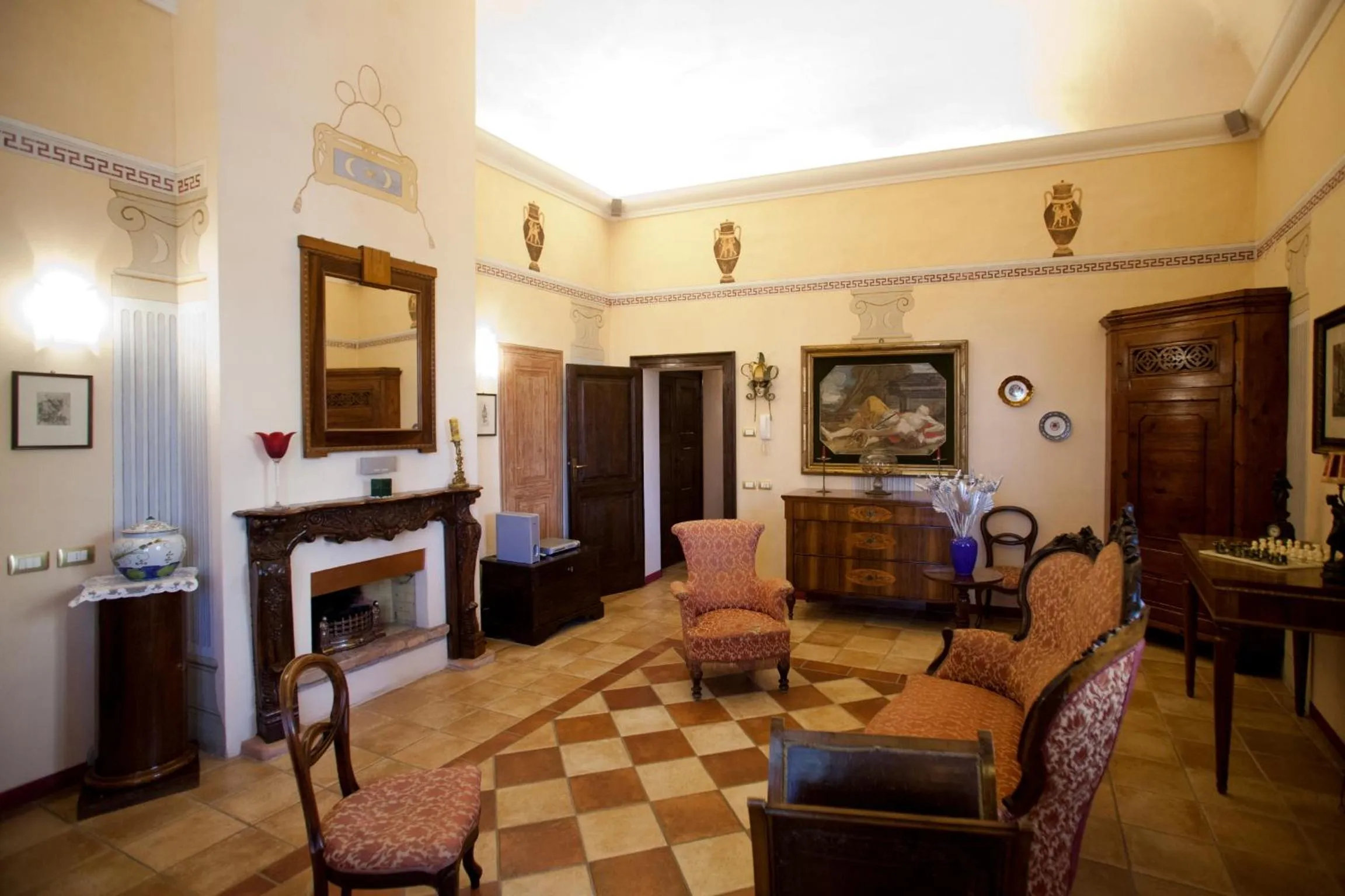 Communal lounge/ TV room in Relais B&B Corte Dei Turchi