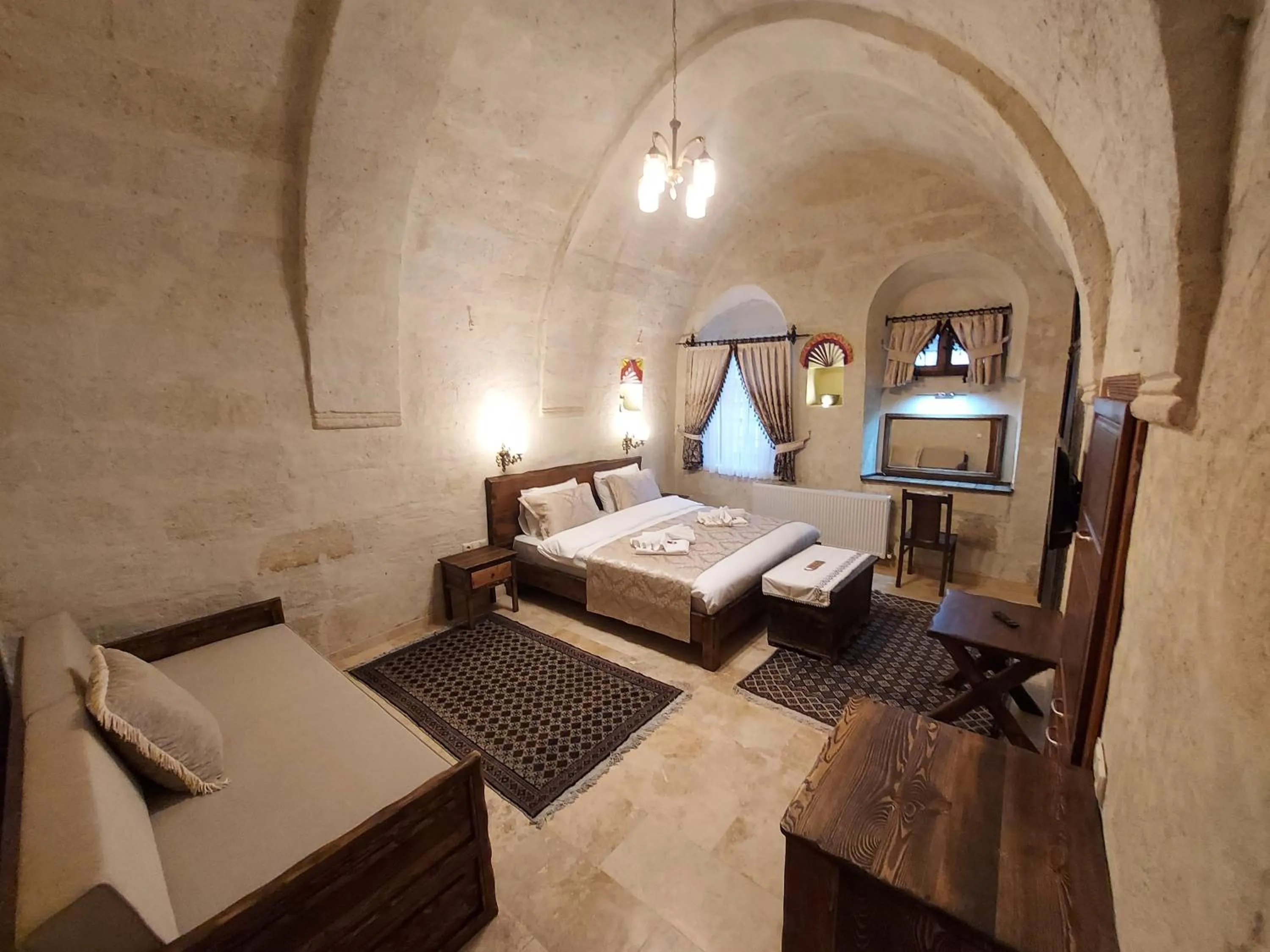 Photo of the whole room, Bed in ARMEsos Cave Hotel