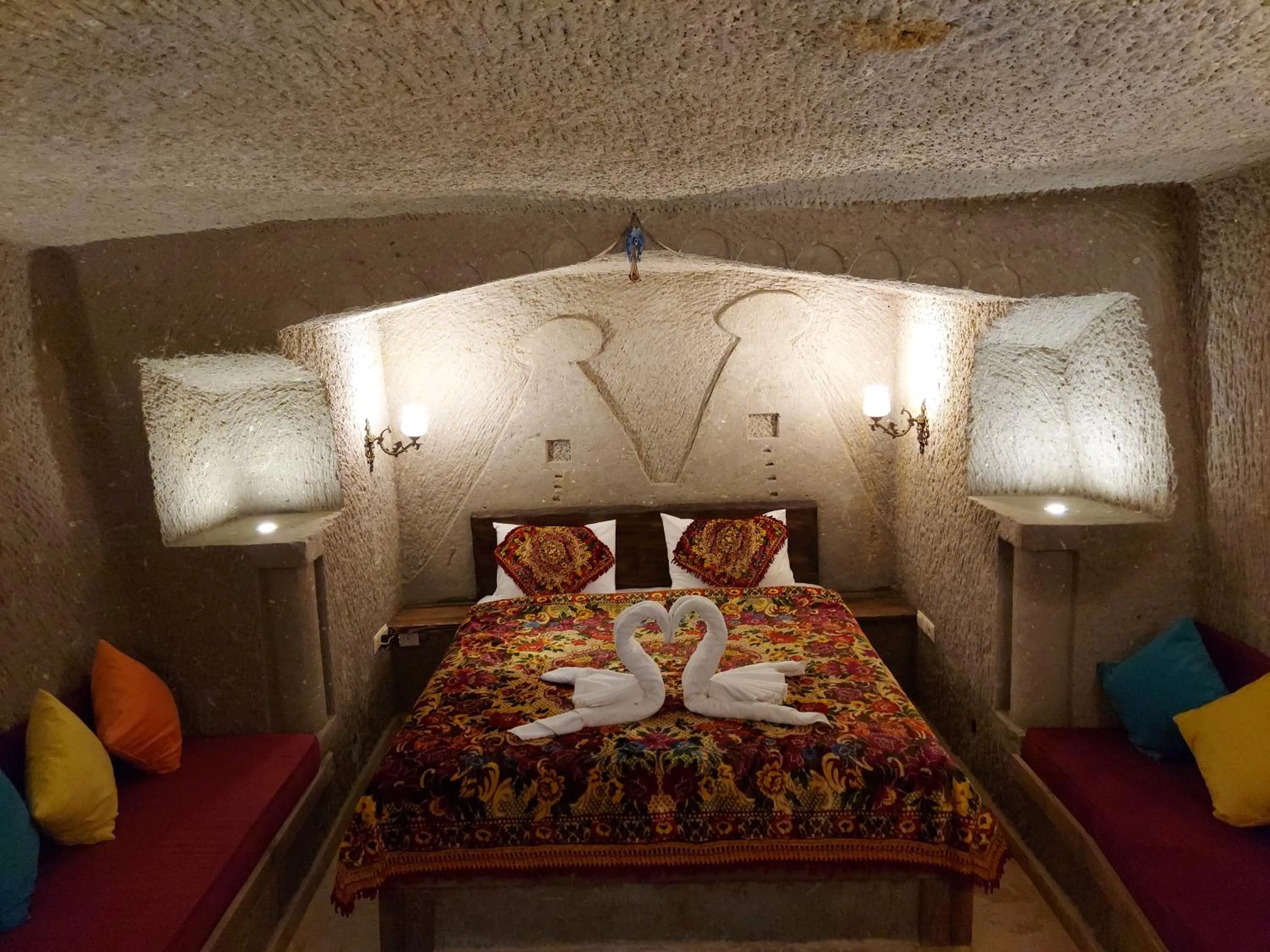 Bed in ARMEsos Cave Hotel
