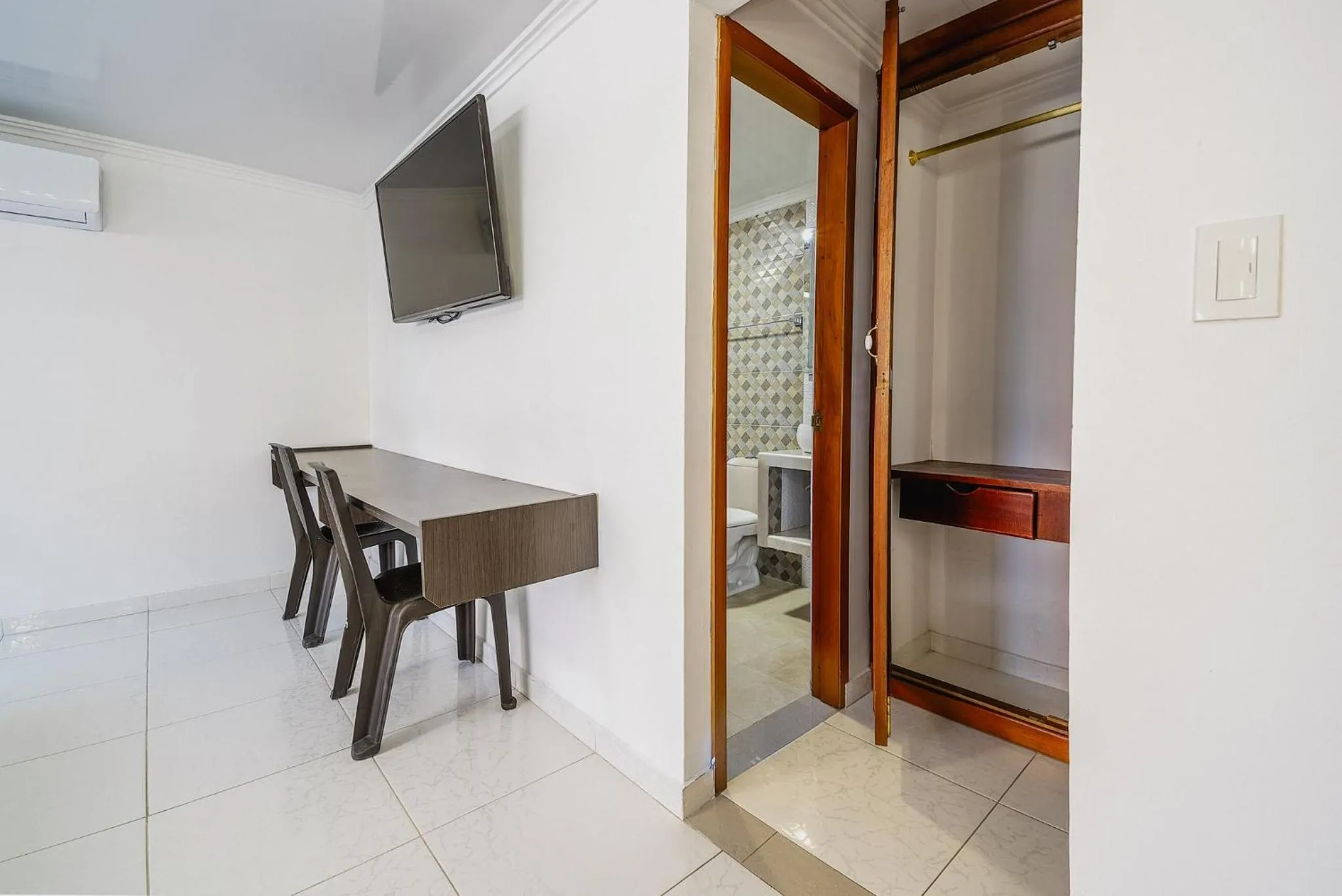 TV and multimedia in Villa Santos Apartaestudios