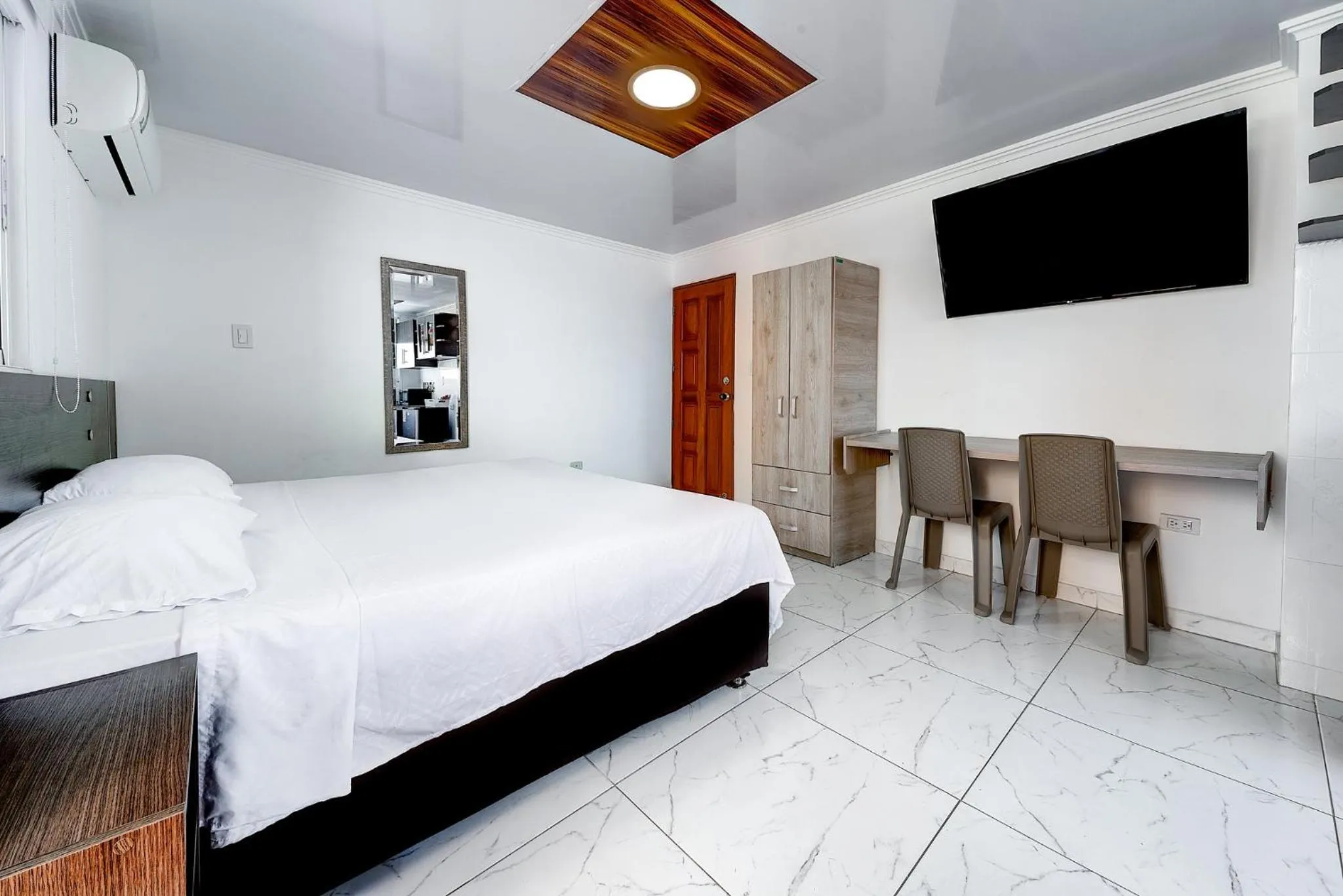 Bedroom, Bed in Villa Santos Apartaestudios