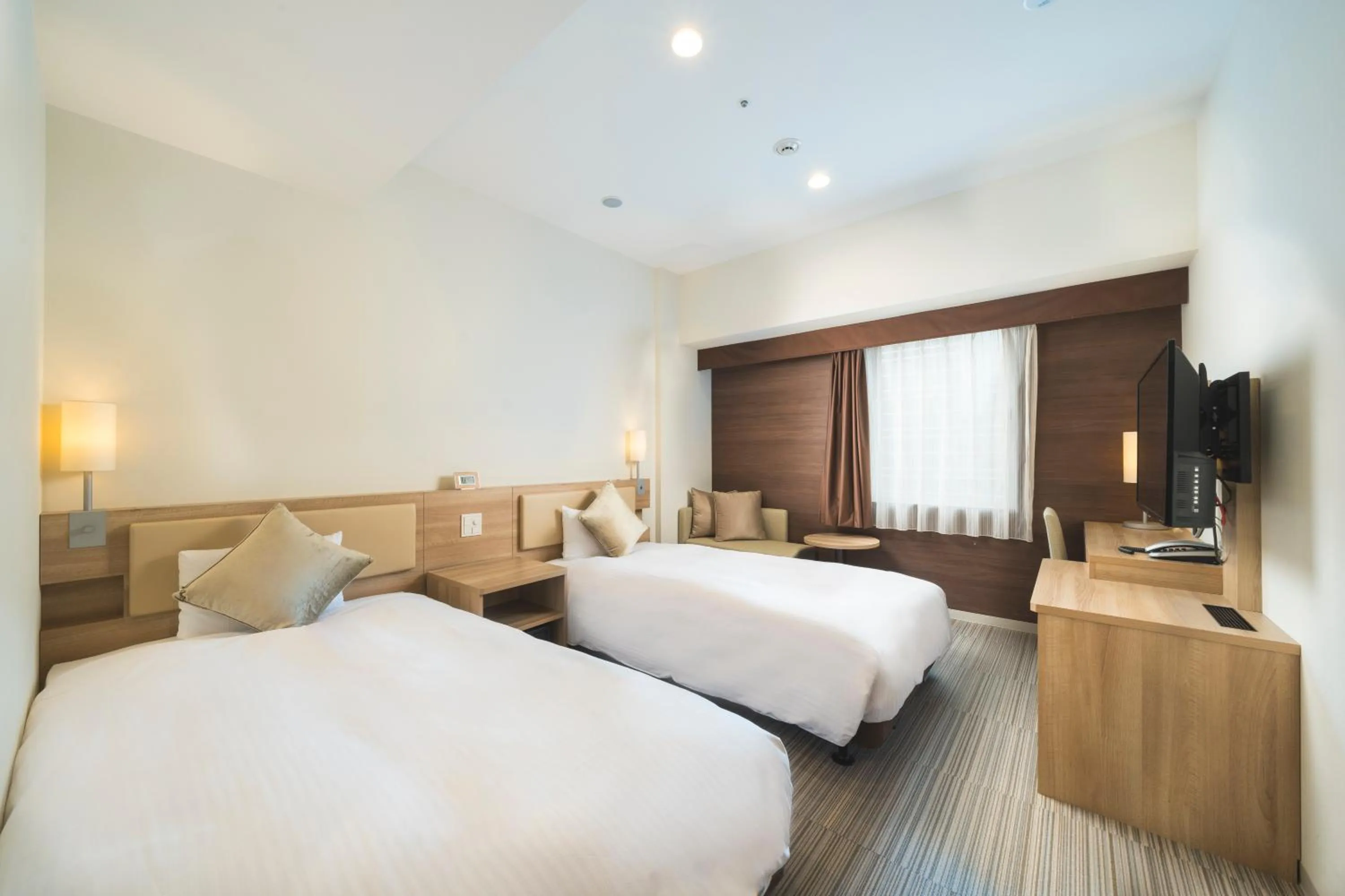 Photo of the whole room, Bed in KOKO HOTEL Hiroshima Ekimae