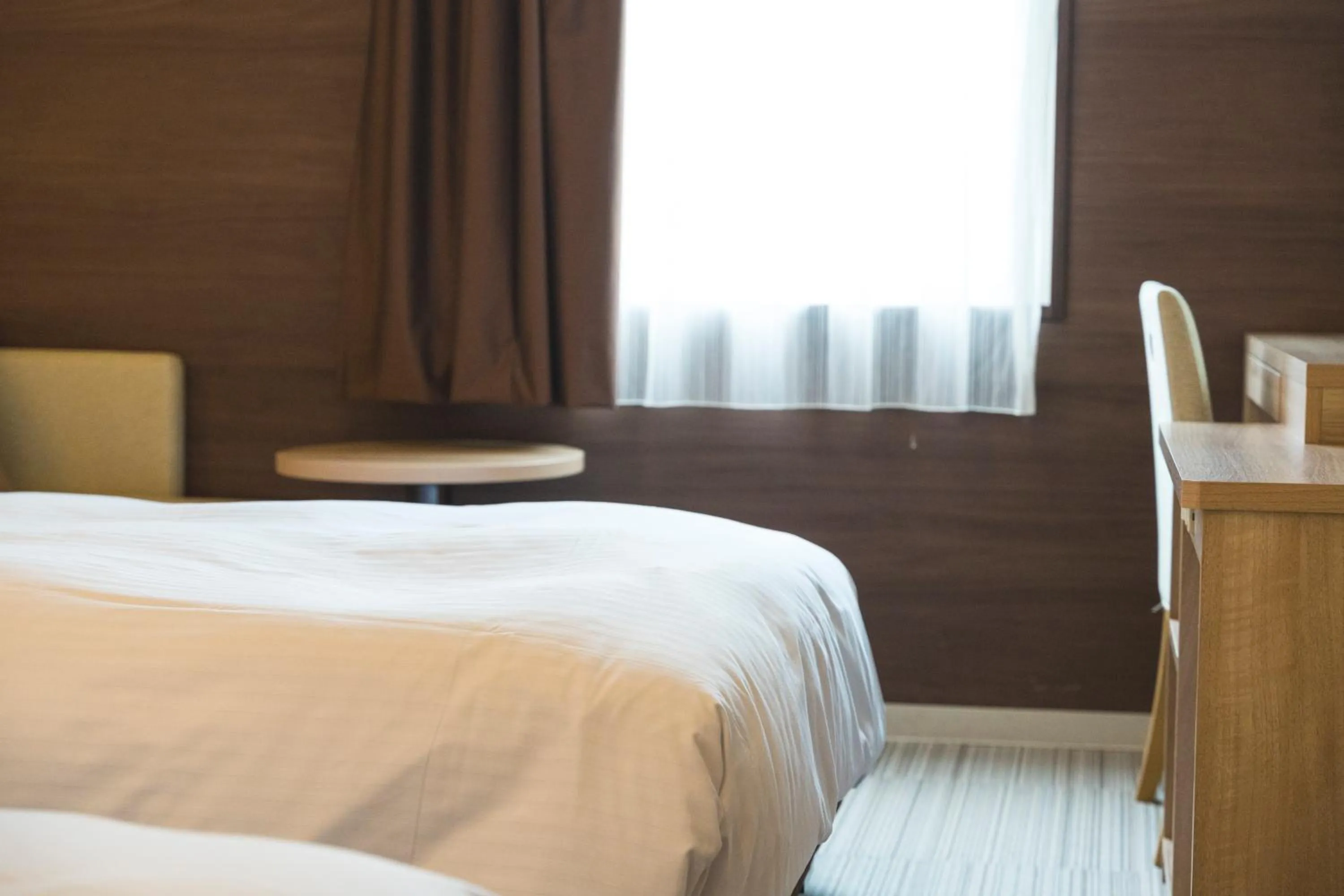 Photo of the whole room, Bed in KOKO HOTEL Hiroshima Ekimae