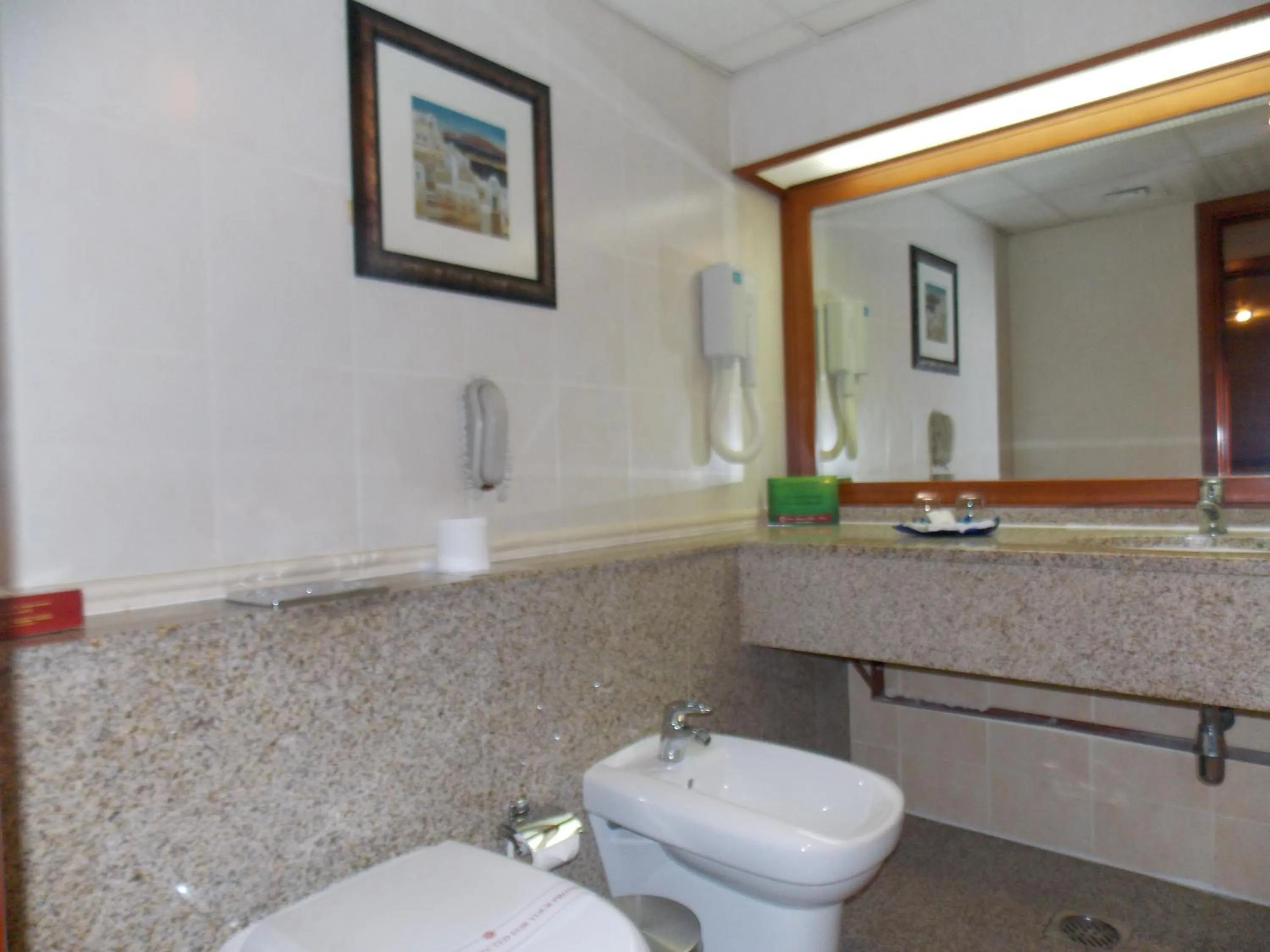 Bathroom in Ramee Royal Hotel