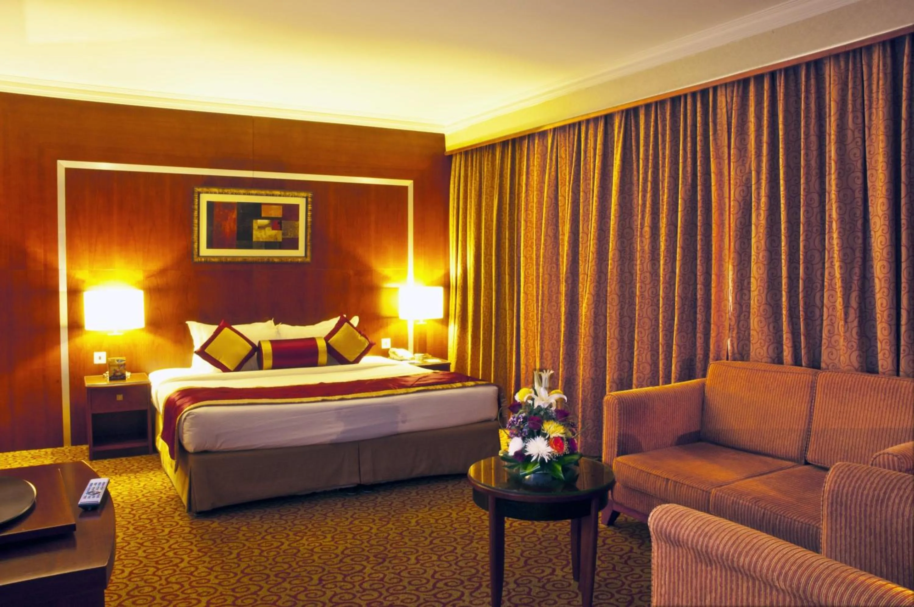 Photo of the whole room, Bed in Ramee Royal Hotel