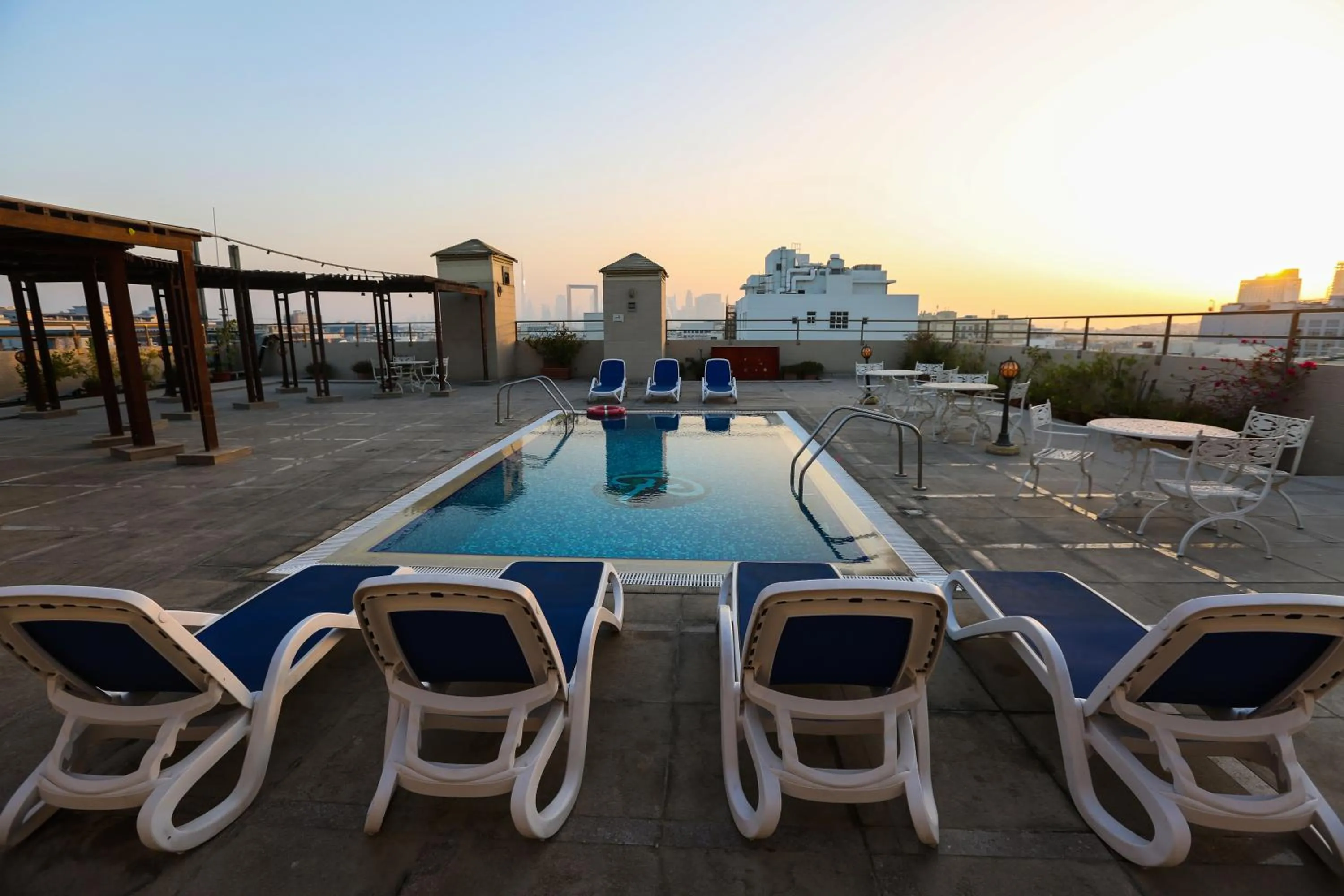 Swimming pool in Ramee Royal Hotel