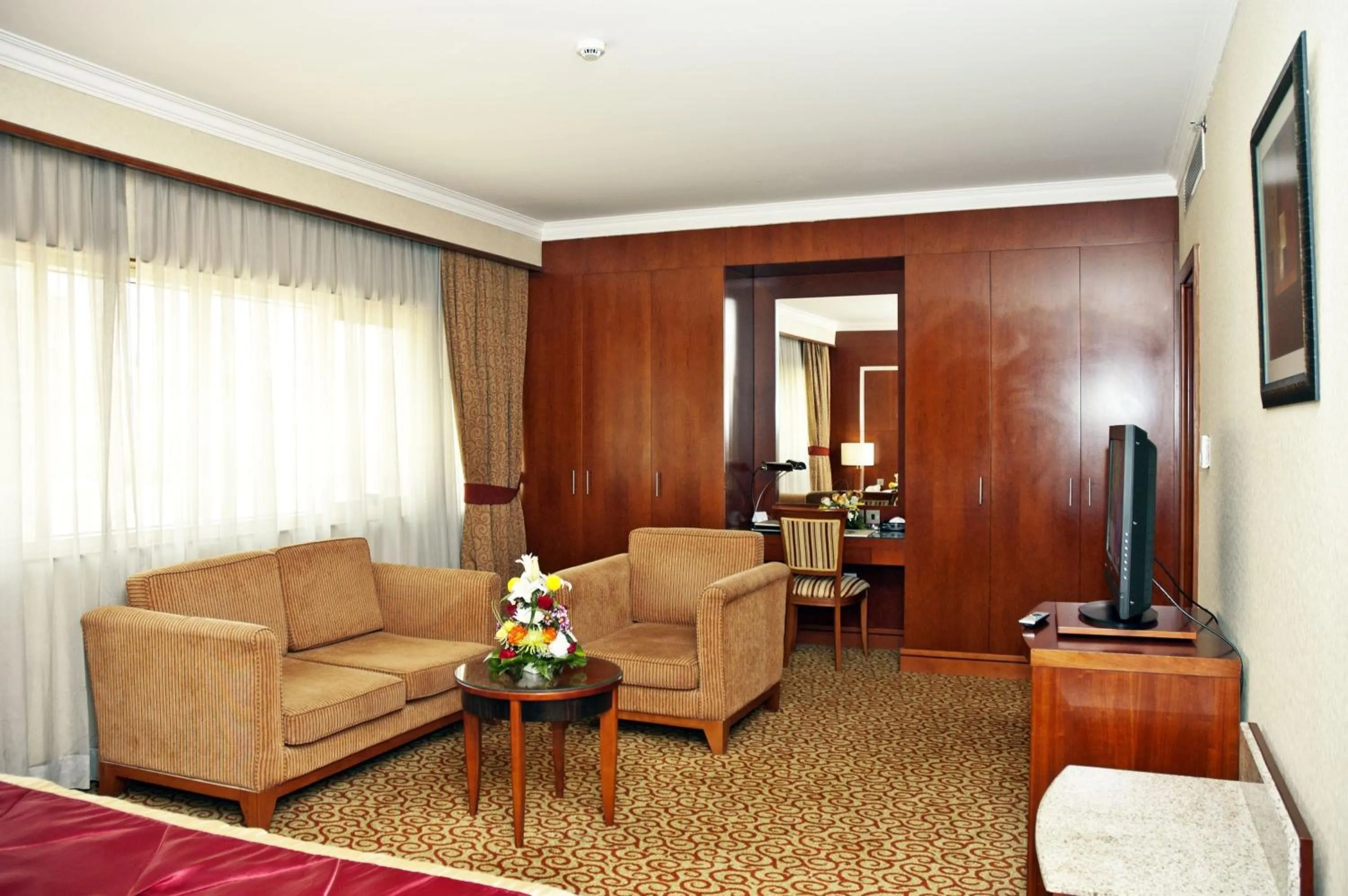Seating area in Ramee Royal Hotel