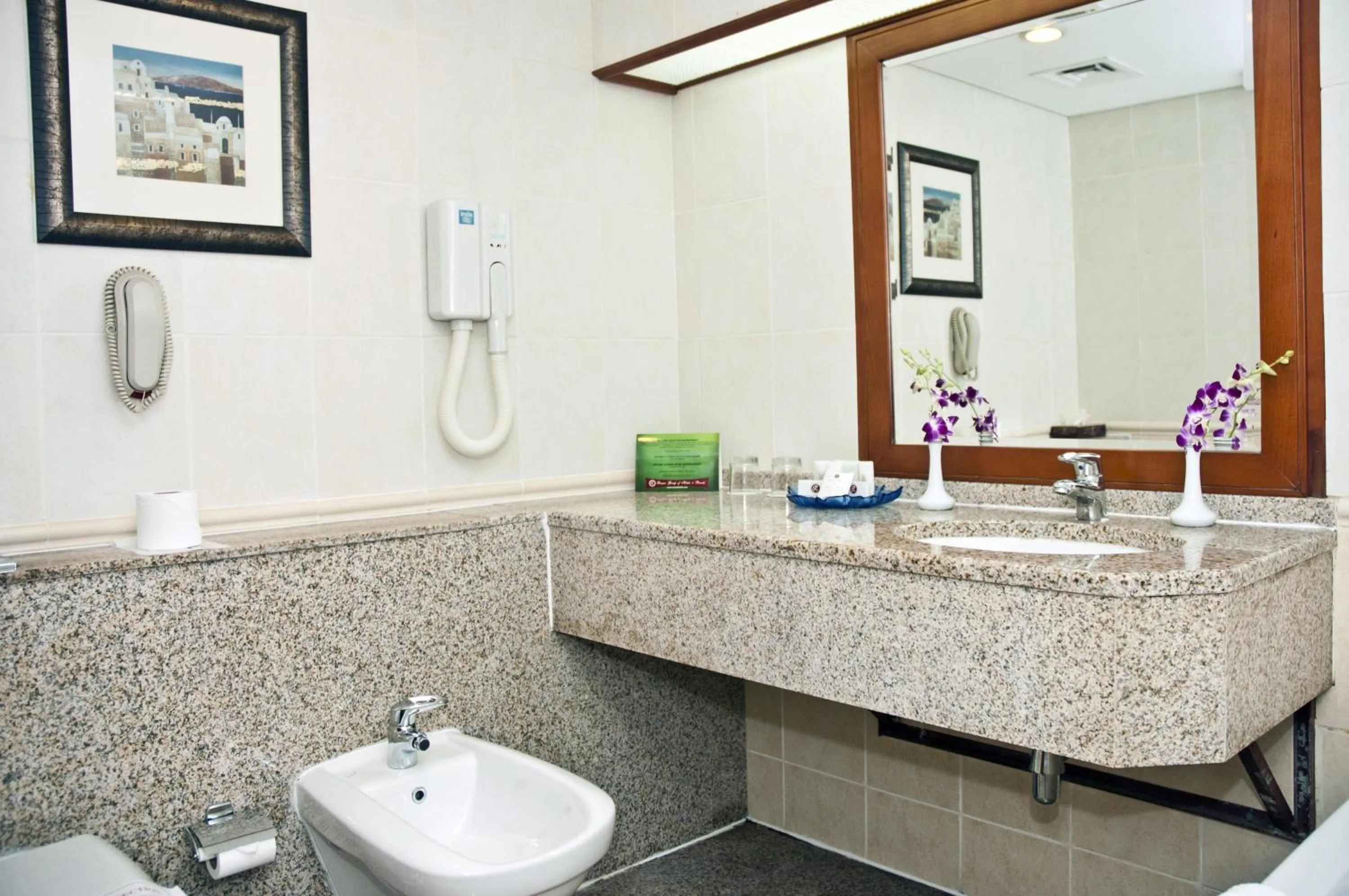 Bathroom in Ramee Royal Hotel