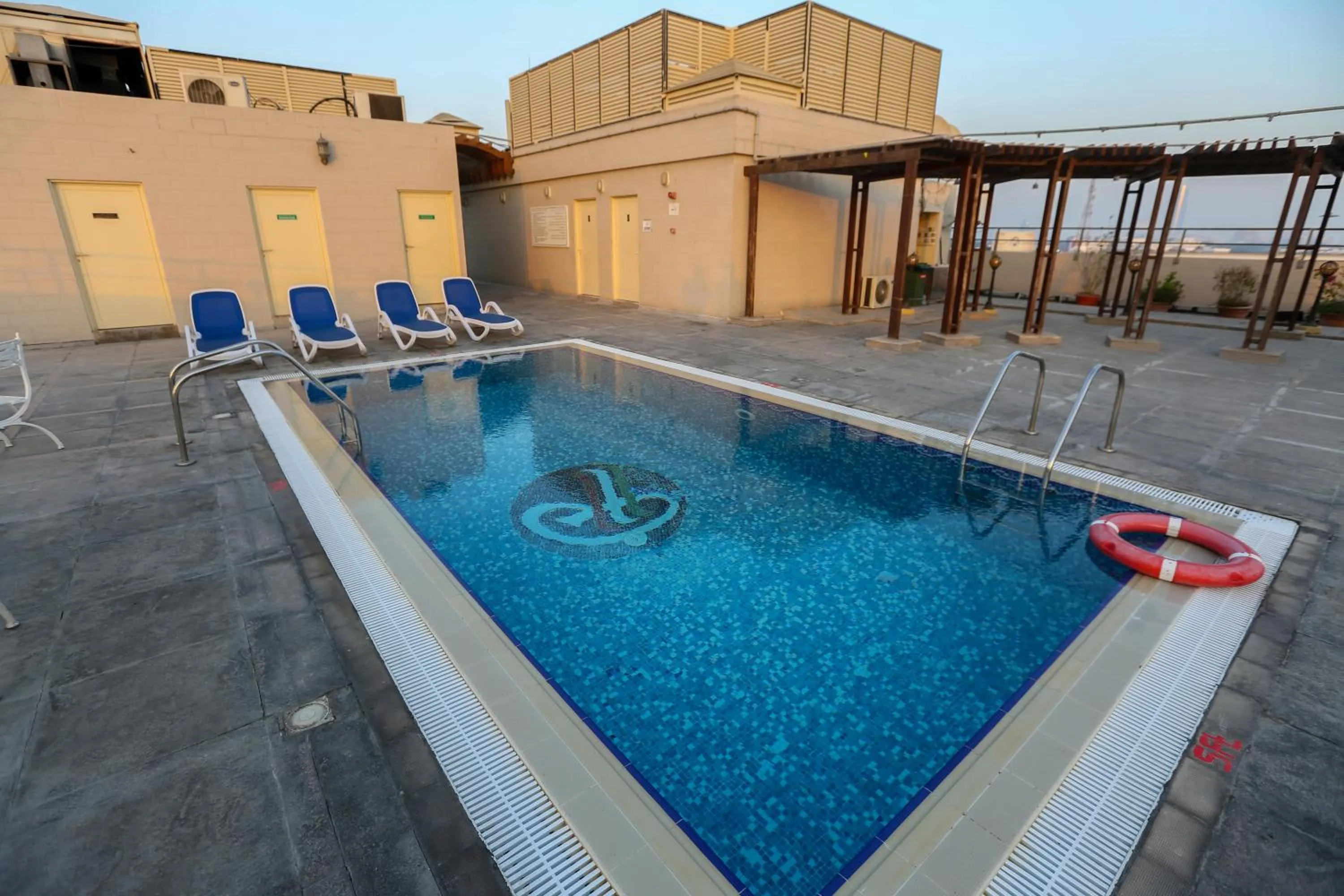 Swimming pool in Ramee Royal Hotel