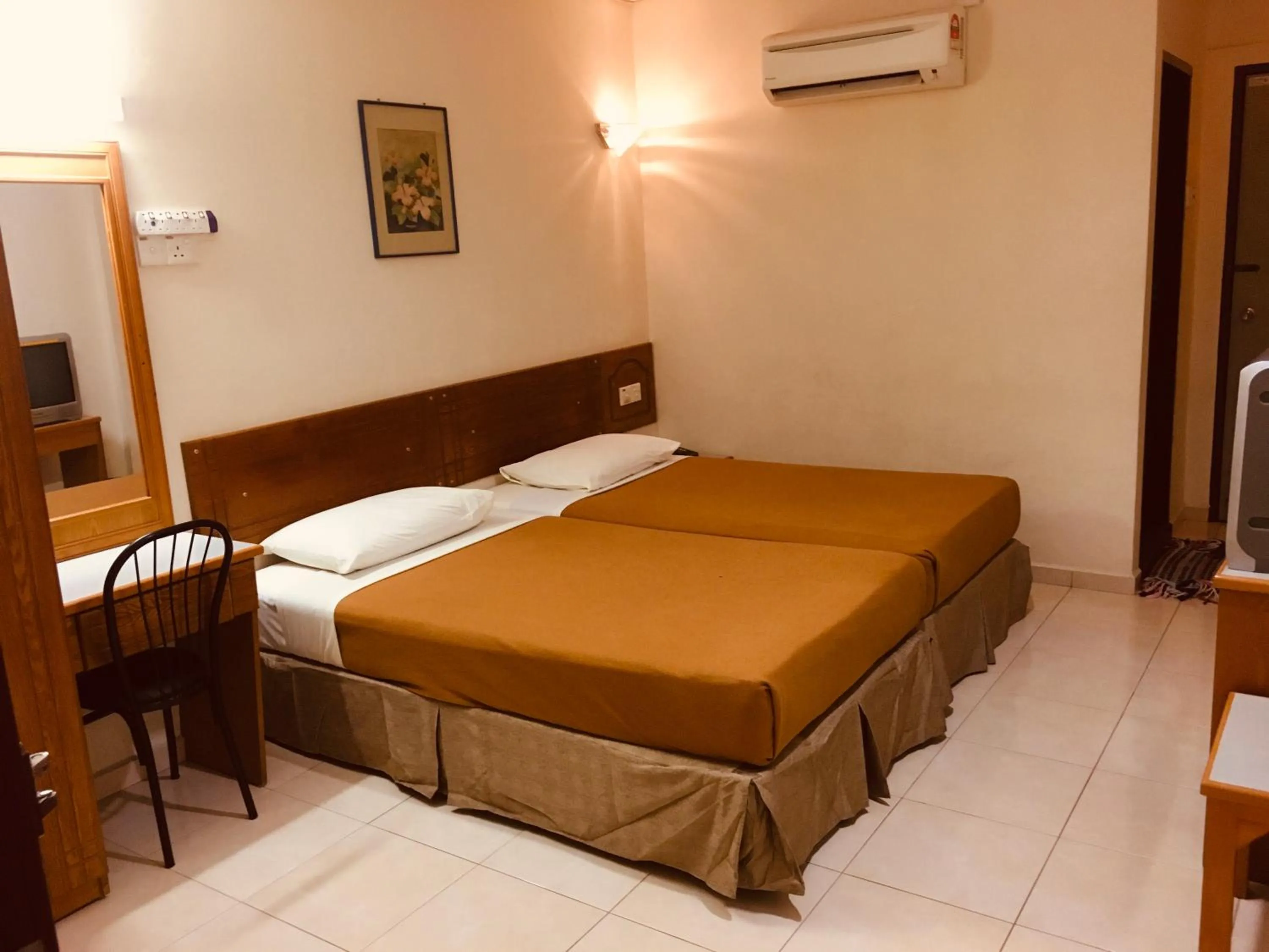 Bed in Coastal Park Hotel