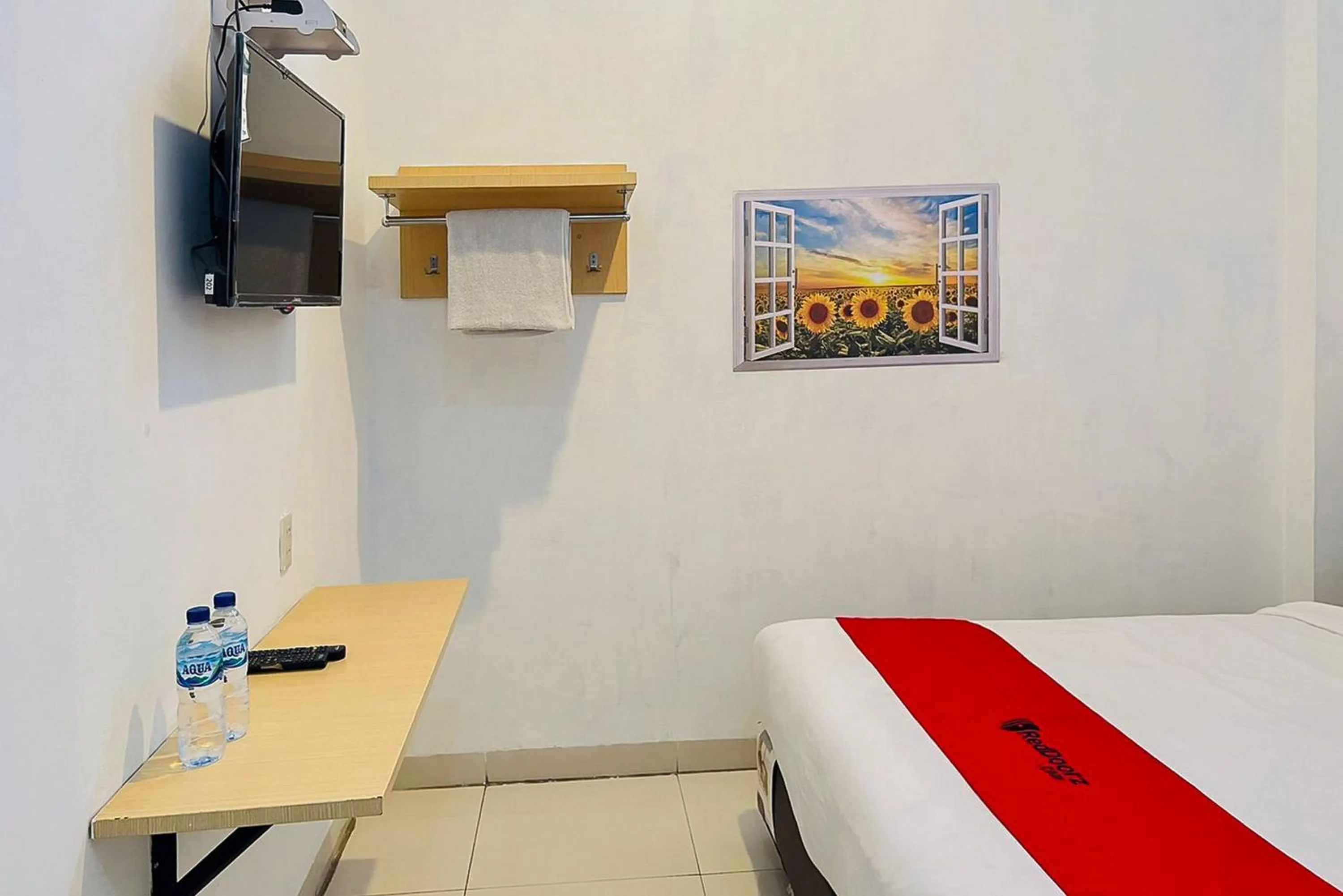 Bed in RedDoorz At Damai Guest House Kabanjahe