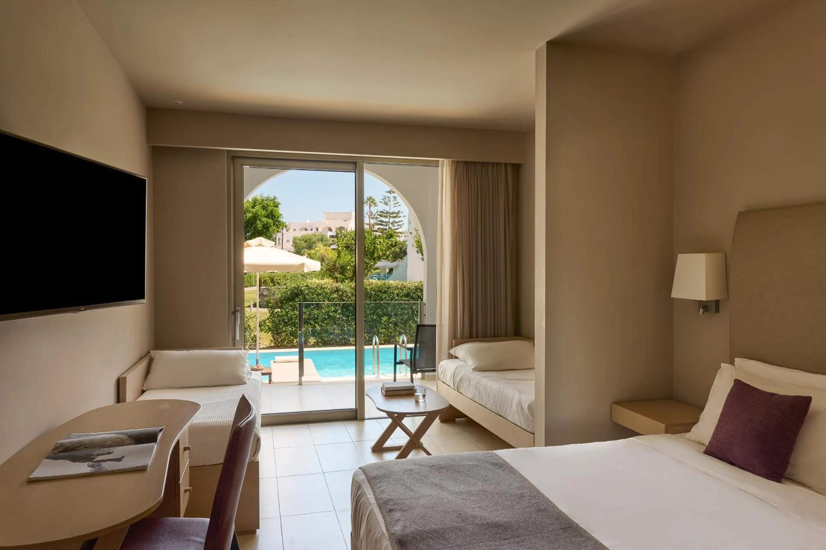 Bed in Atlantica Akti Zeus Hotel