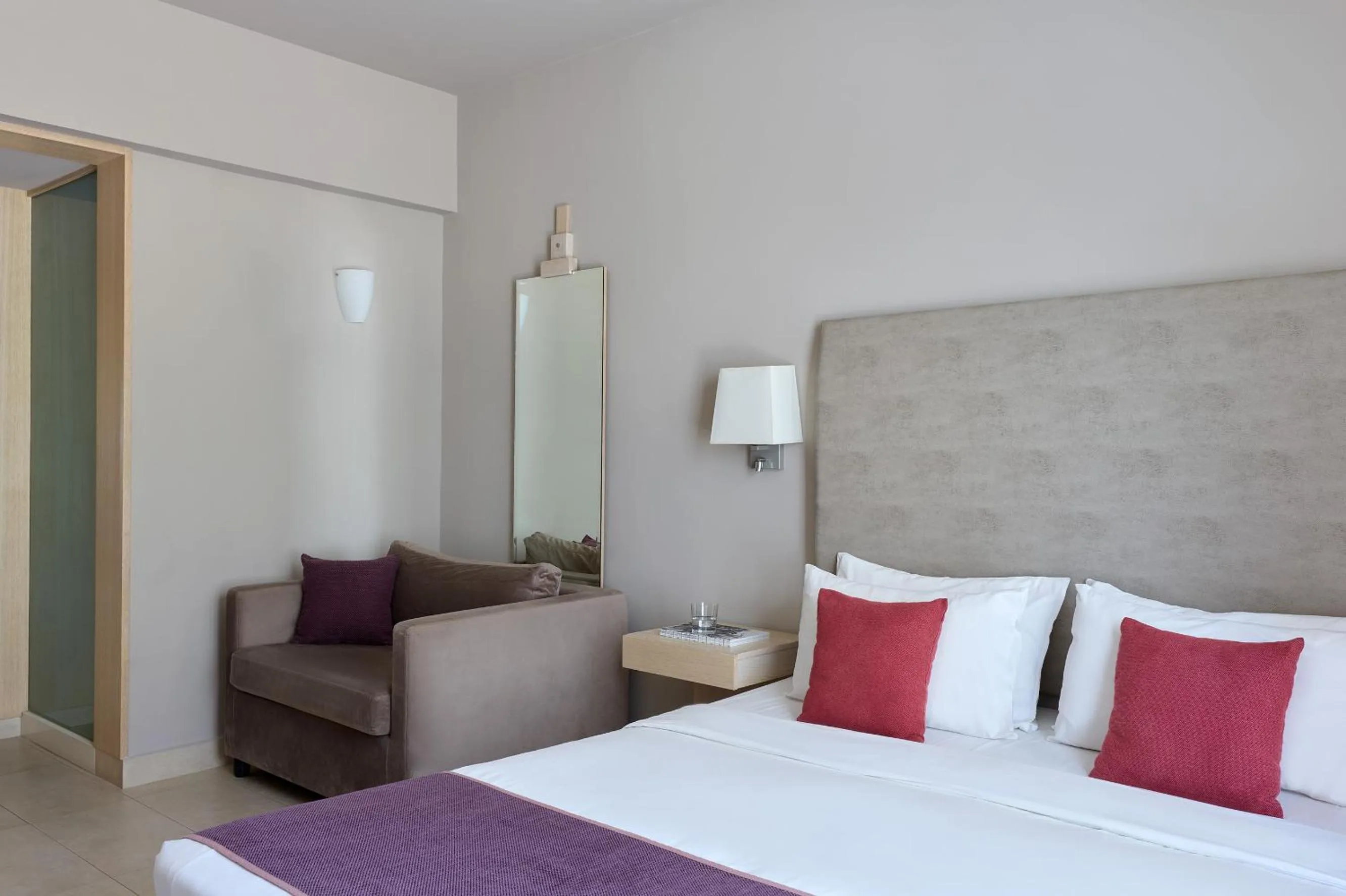 Bed in Atlantica Akti Zeus Hotel