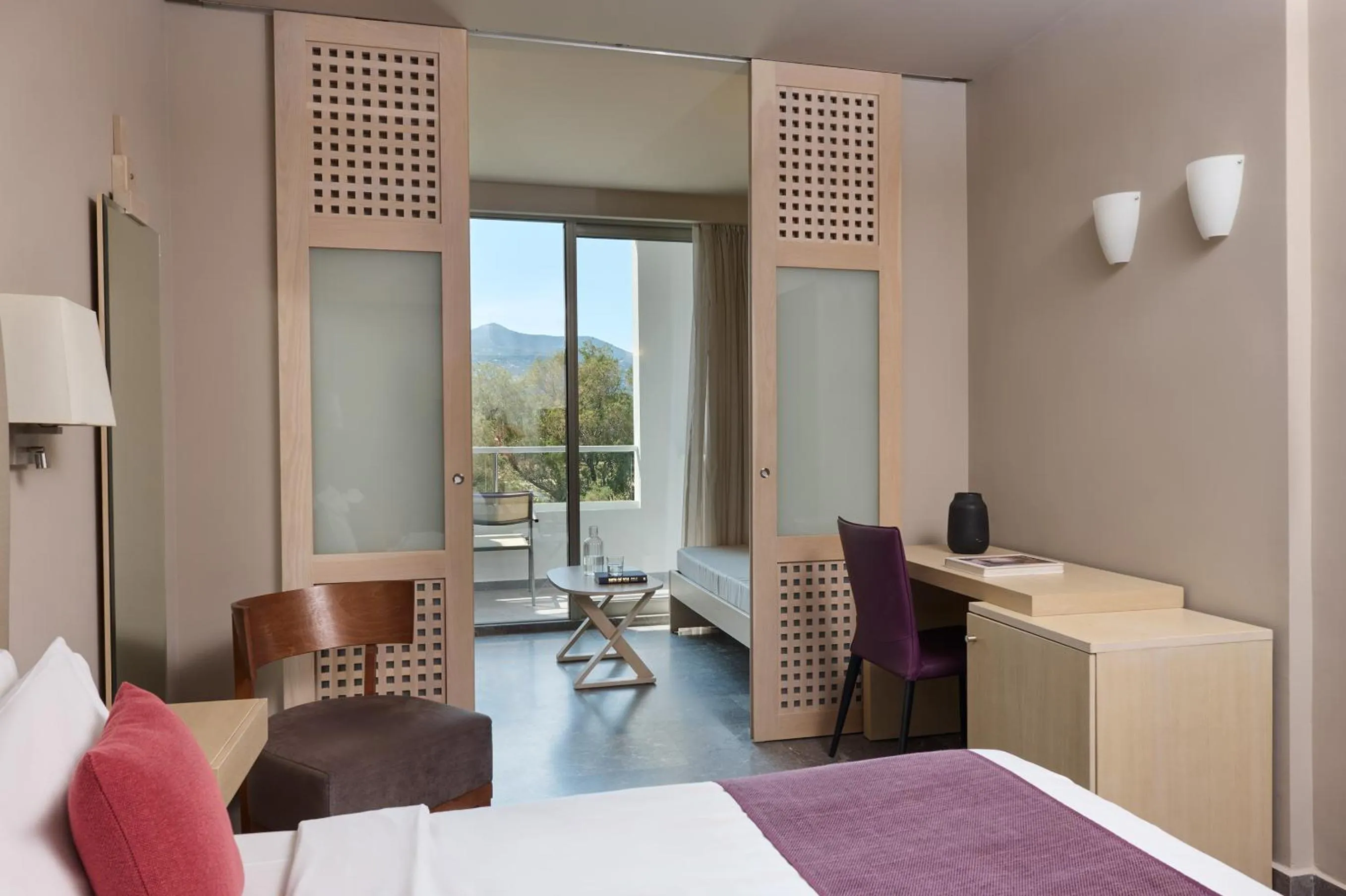 Bed in Atlantica Akti Zeus Hotel