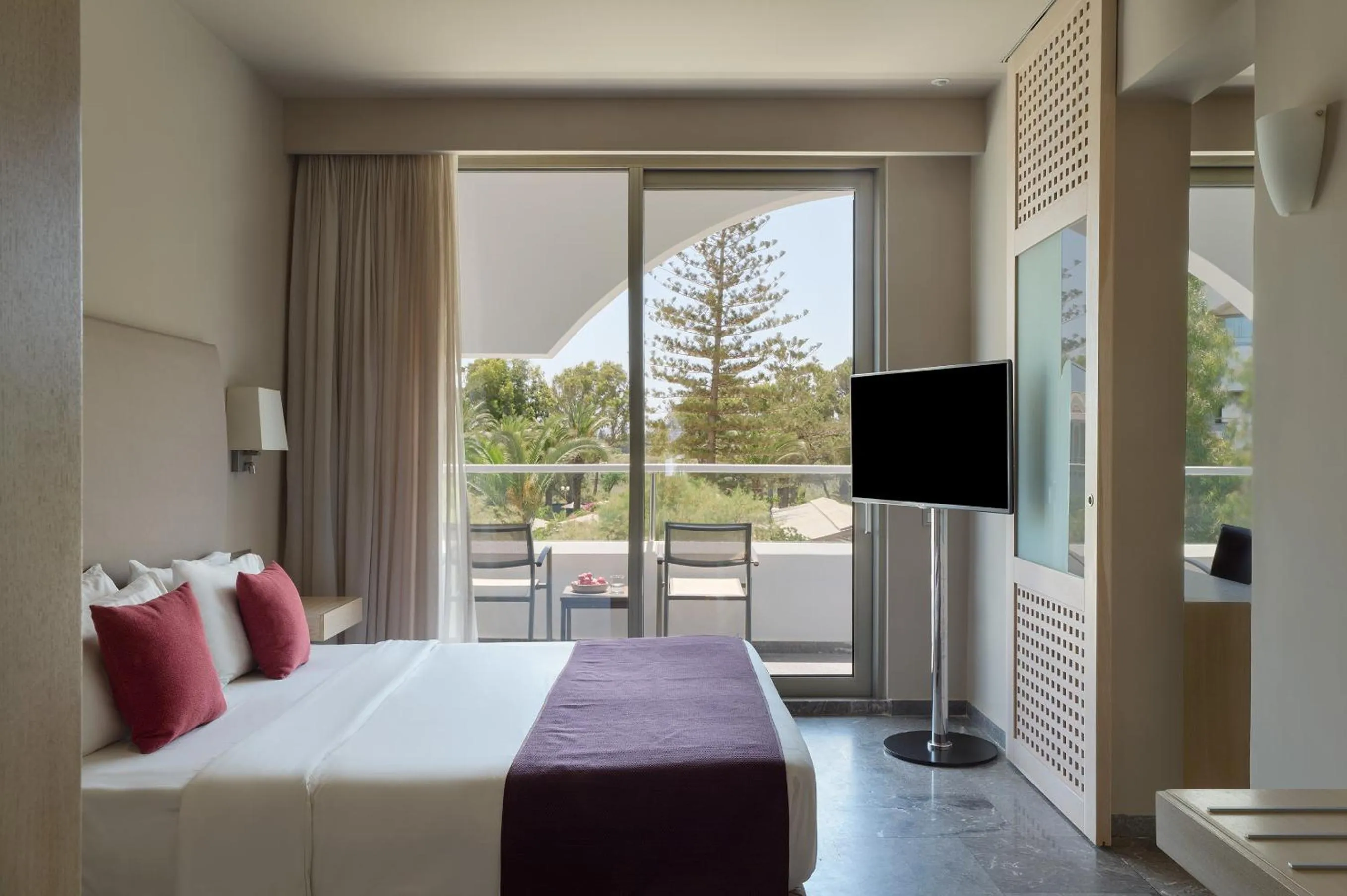 Bed in Atlantica Akti Zeus Hotel