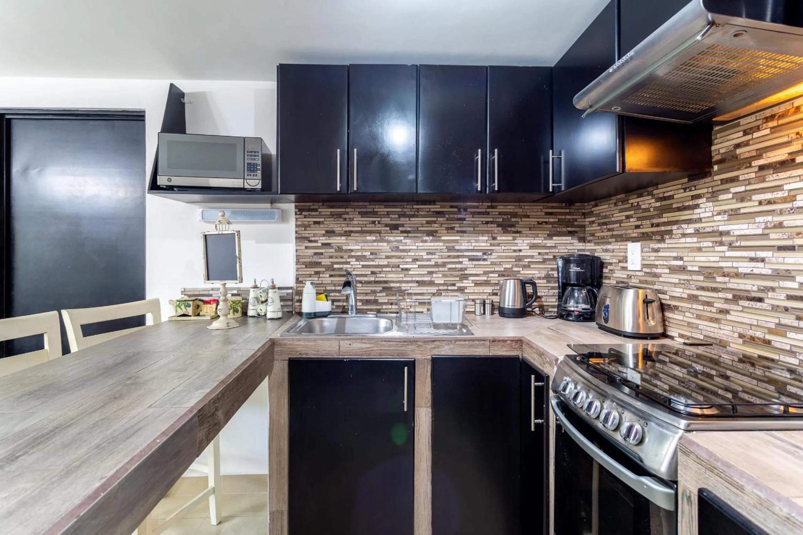 Coffee/tea facilities in Suites 259 Condesa