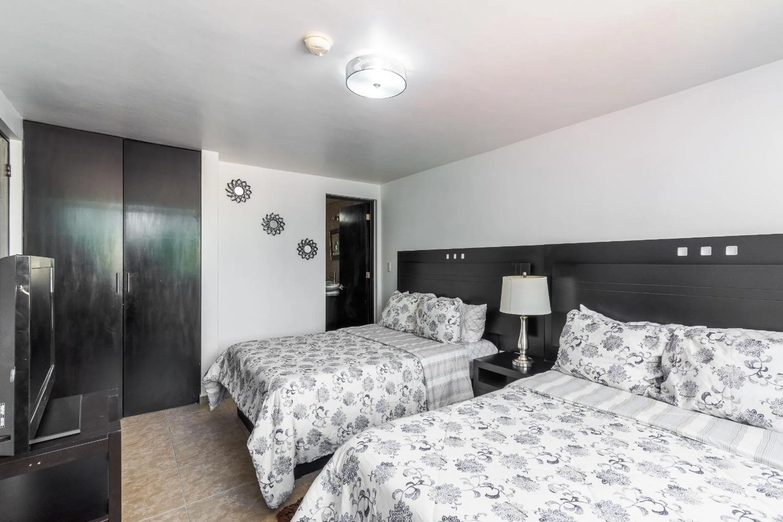 Toilet, Bed in Suites 259 Condesa