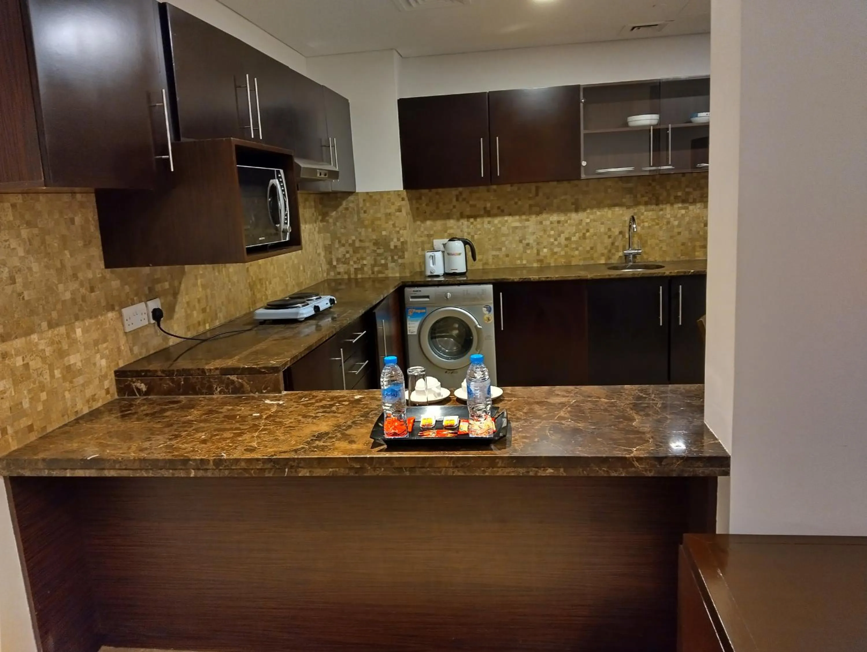 Kitchen or kitchenette in Tulip Creek Hotel Apartments