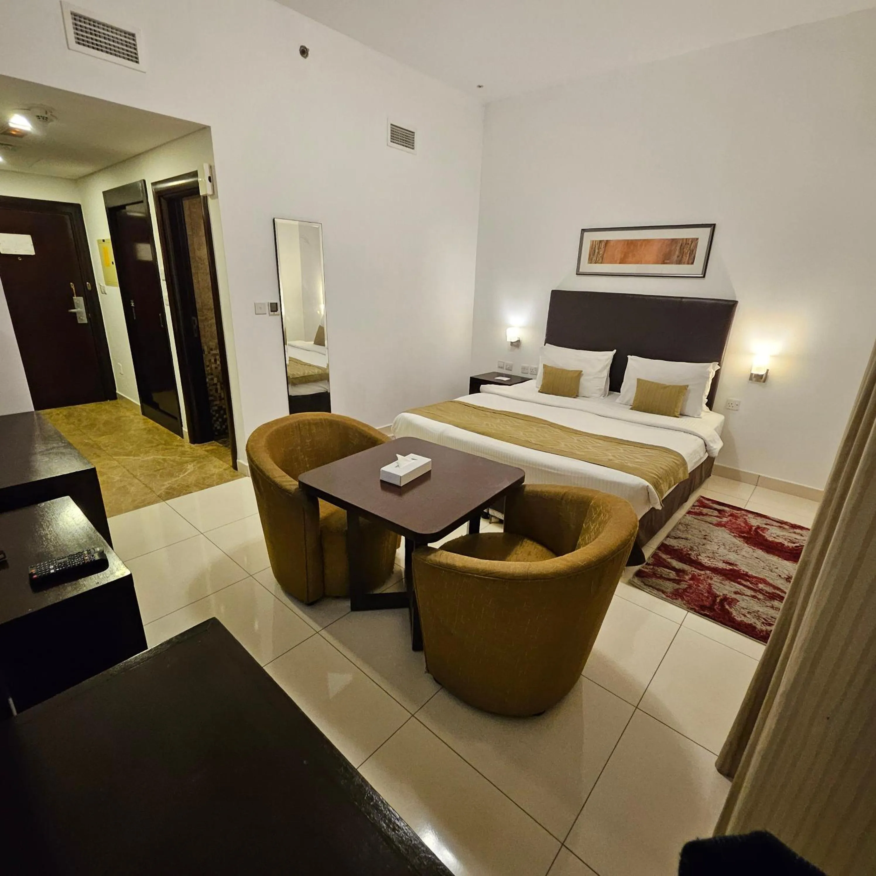 Bed in Tulip Creek Hotel Apartments