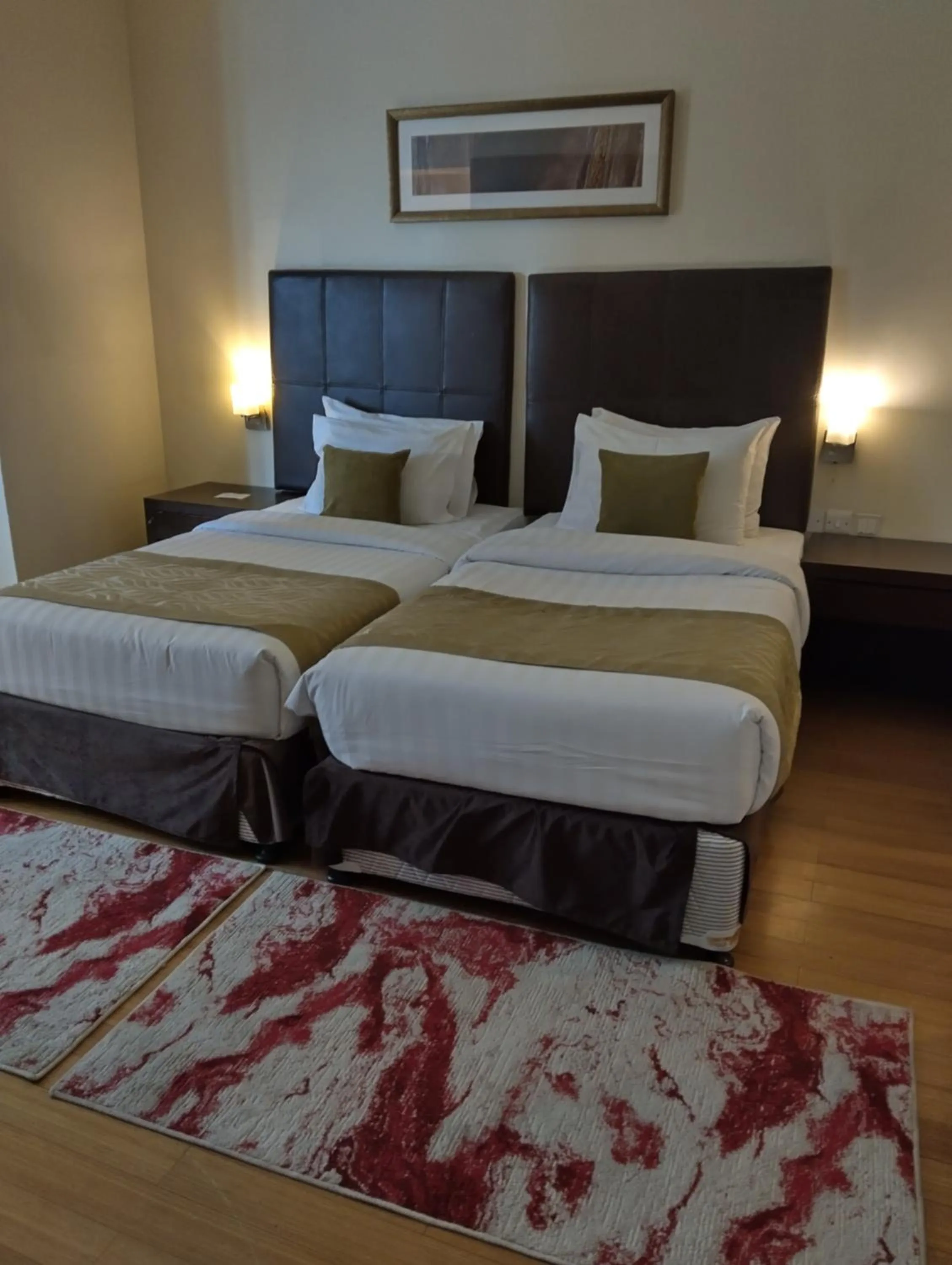 Bed in Tulip Creek Hotel Apartments