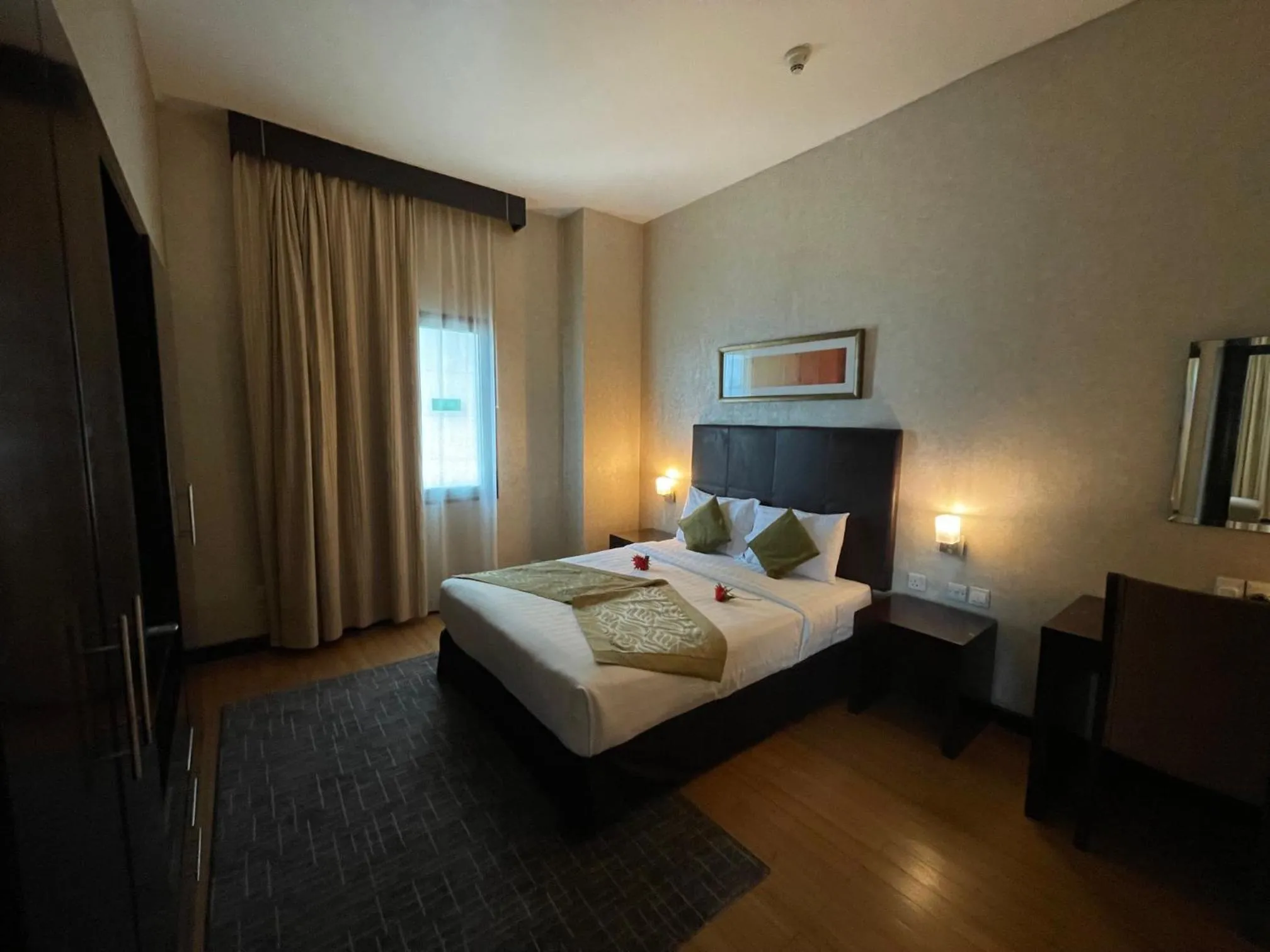 Bed in Tulip Creek Hotel Apartments