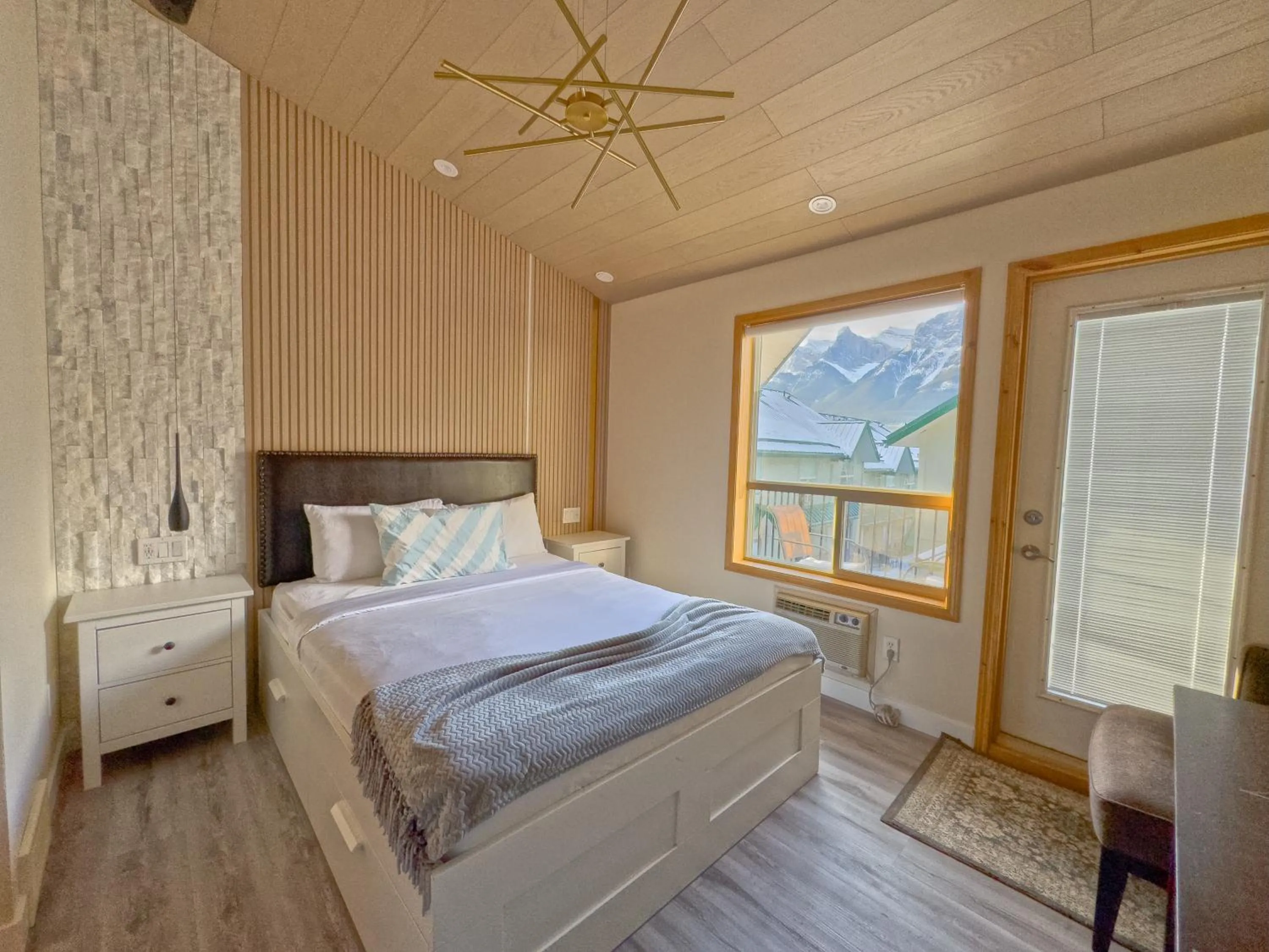 Bed in Banff Woods lodge