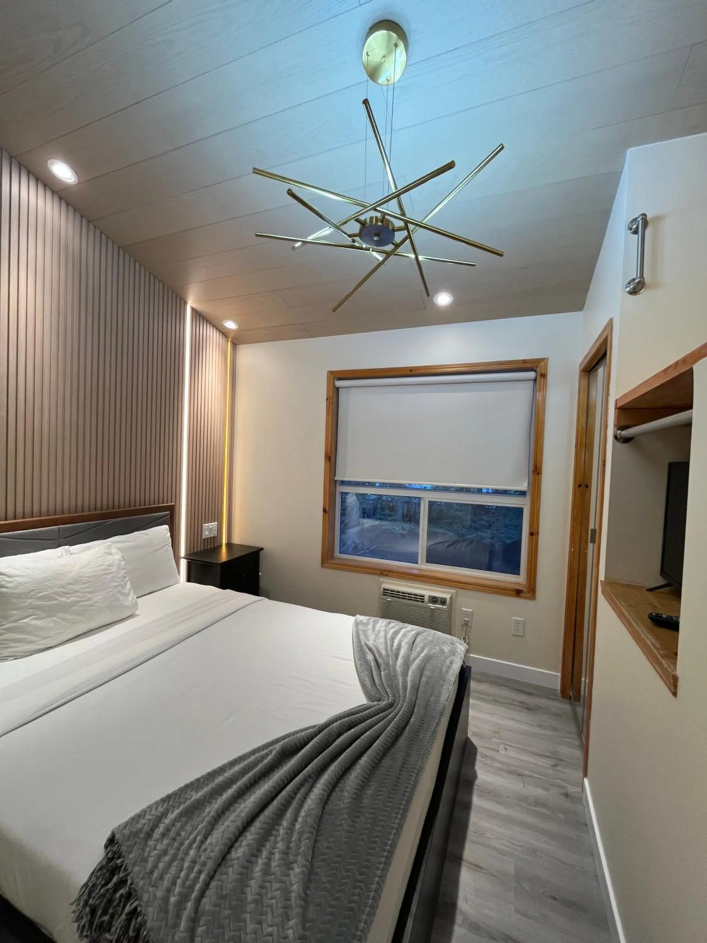 Bed in Banff Woods lodge