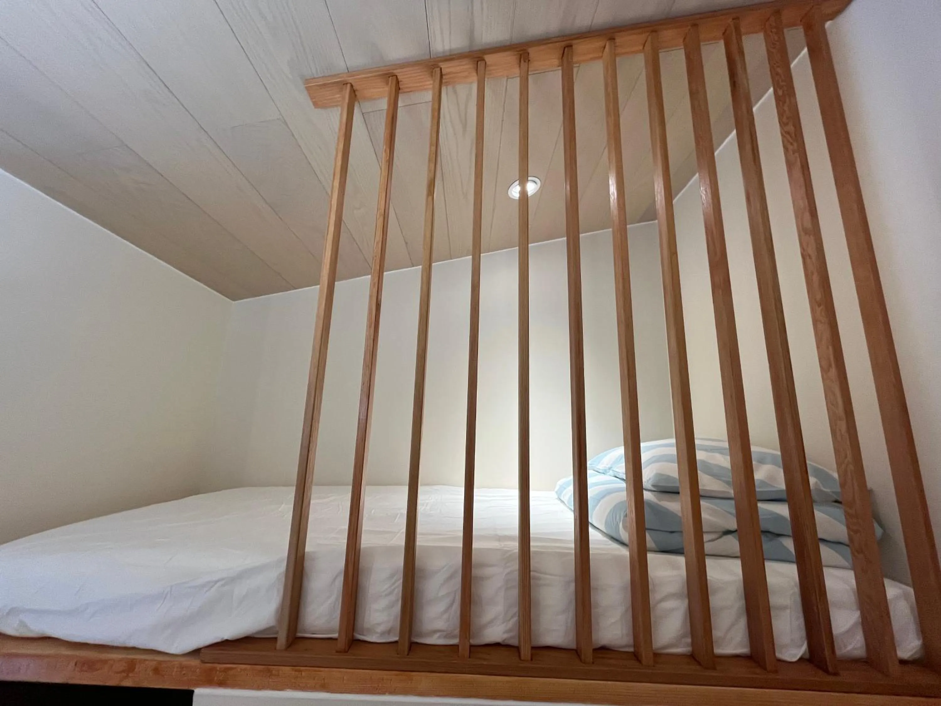 Bed in Banff Woods lodge