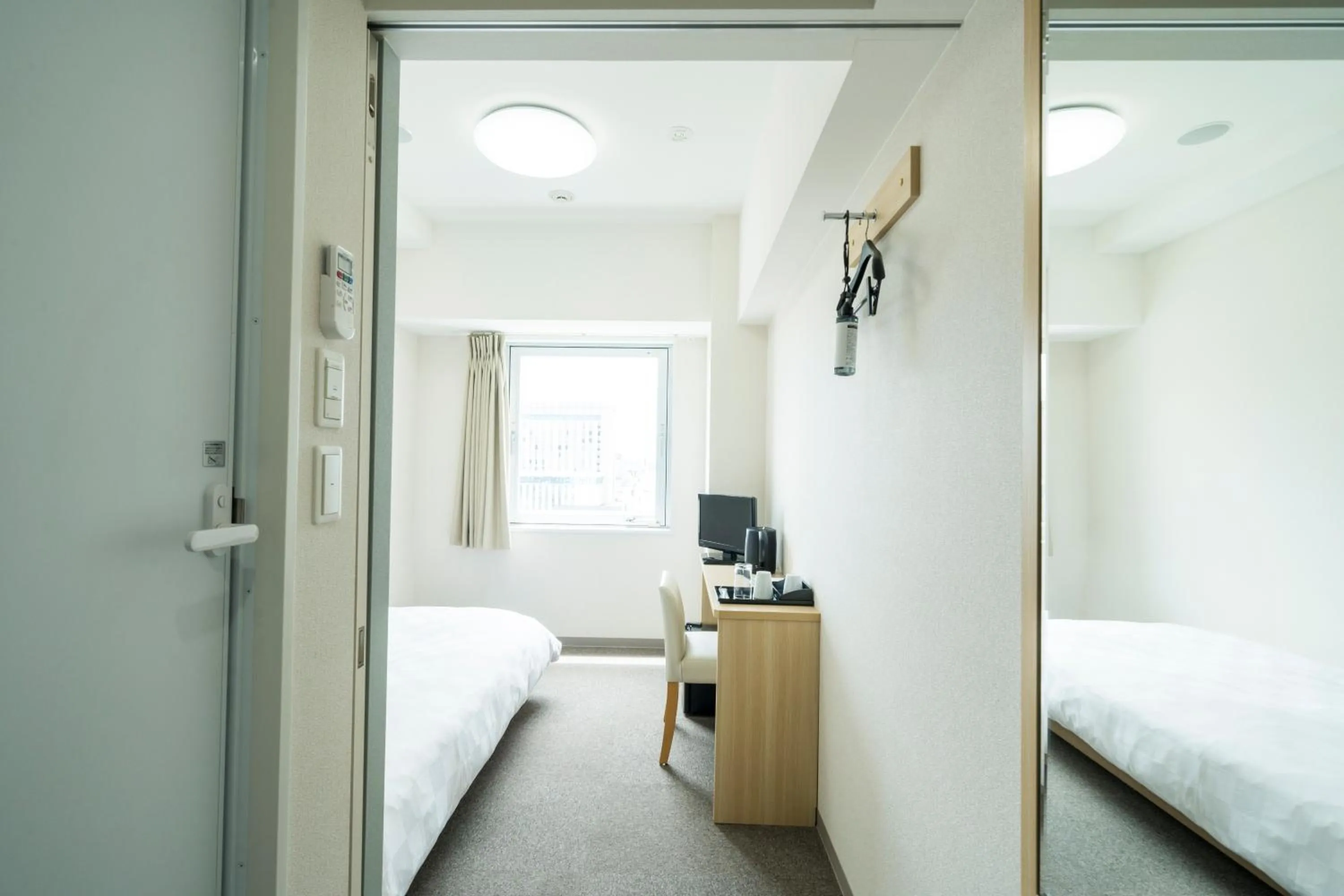 Photo of the whole room, Bed in KOKO HOTEL Kagoshima Tenmonkan