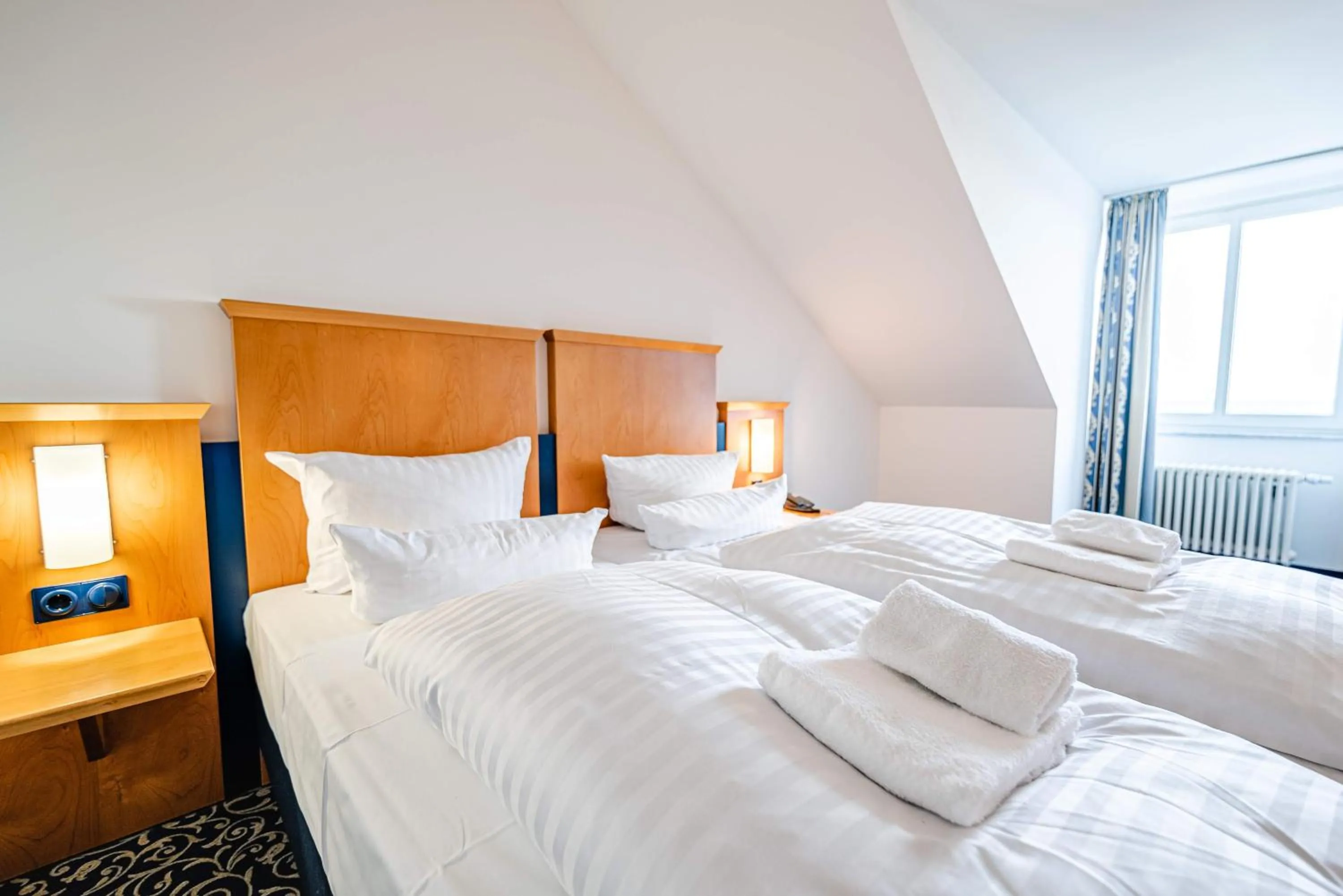 Photo of the whole room, Bed in Hotel Asgard's Meereswarte