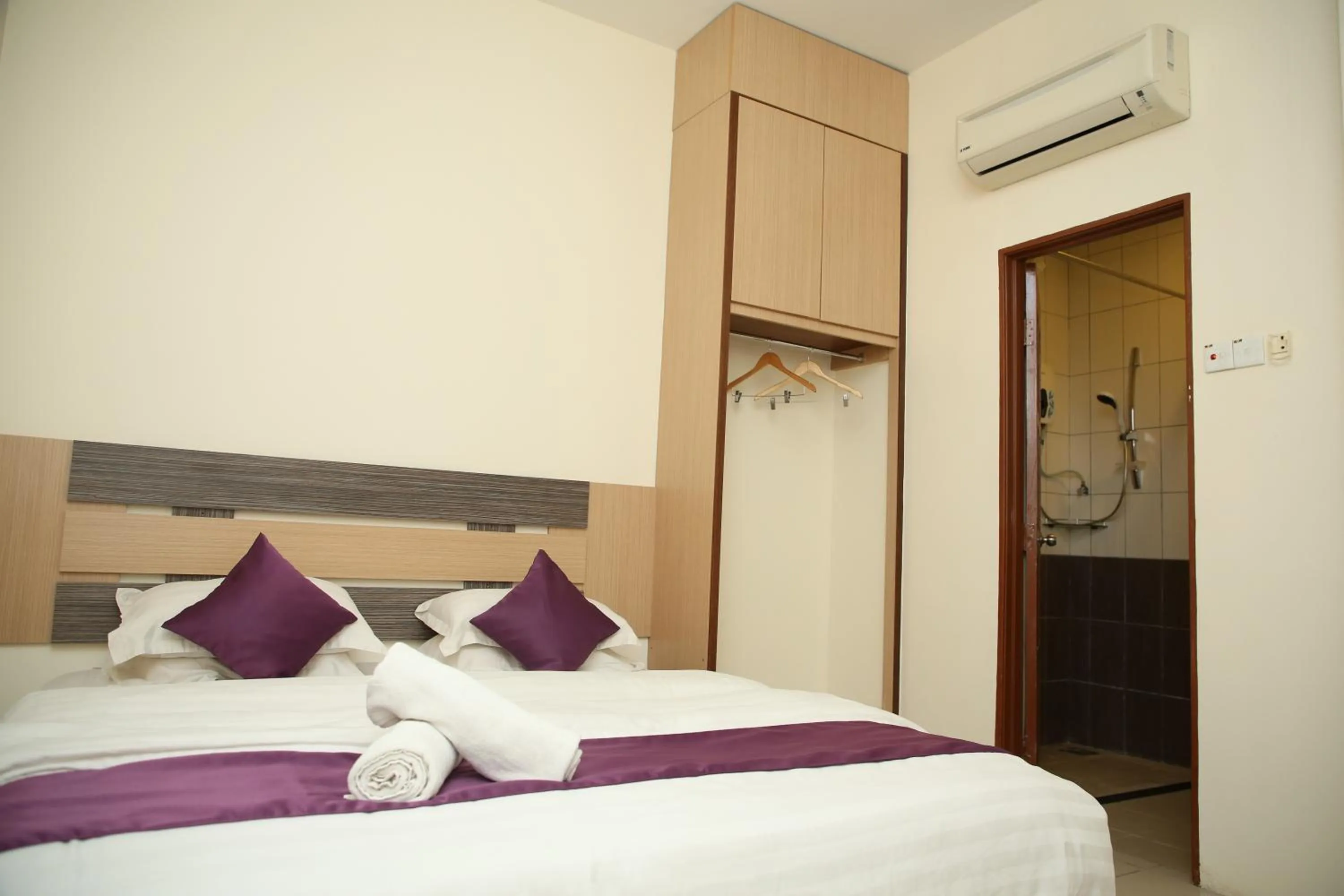 Bed in MY Fame Hotel