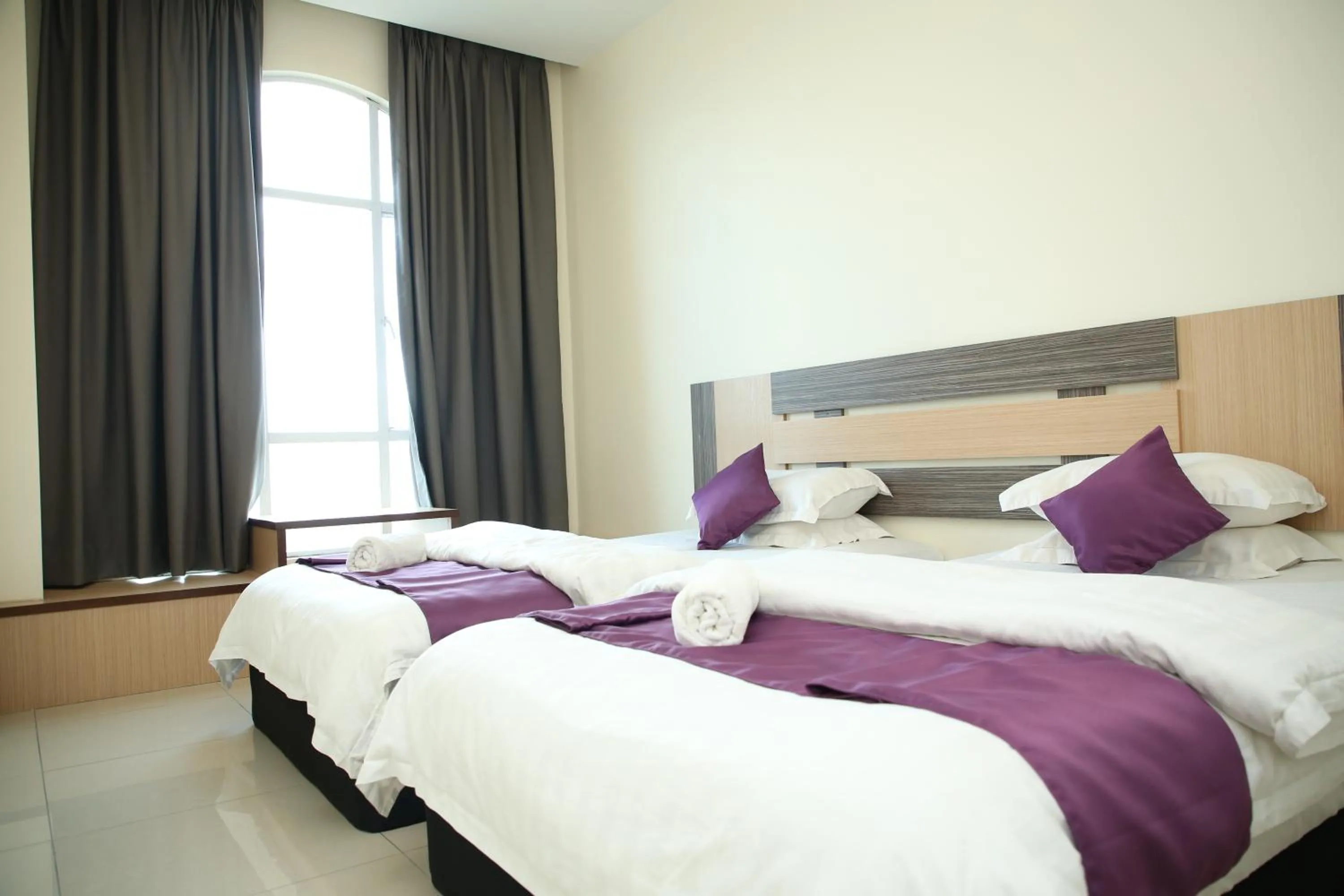 Bed in MY Fame Hotel