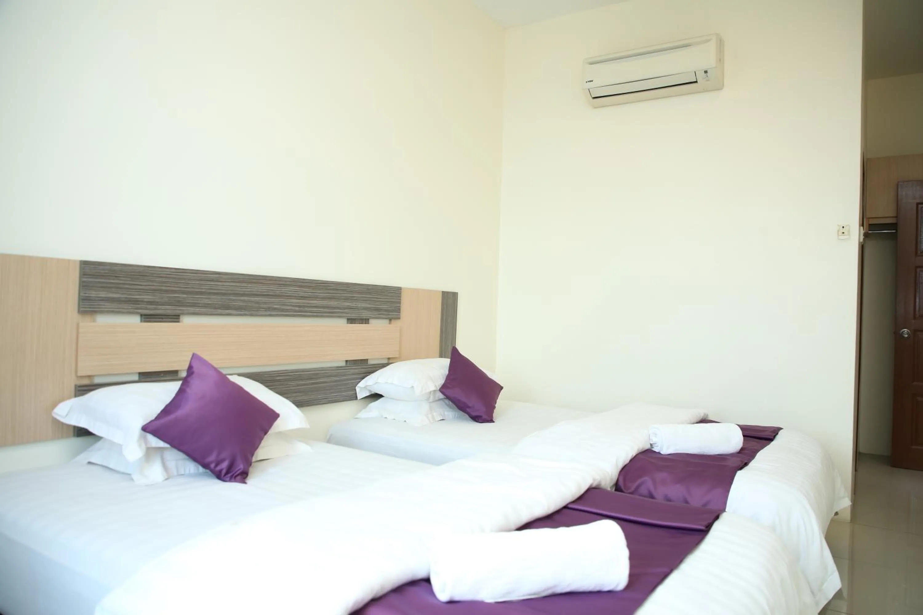 Bed in MY Fame Hotel