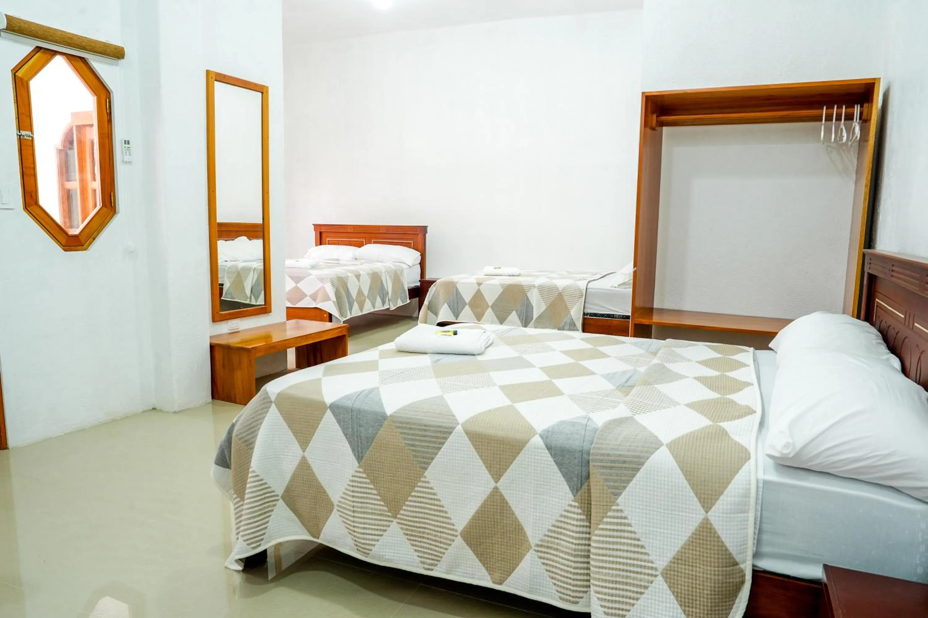 Bed in Royal Galápagos Inn