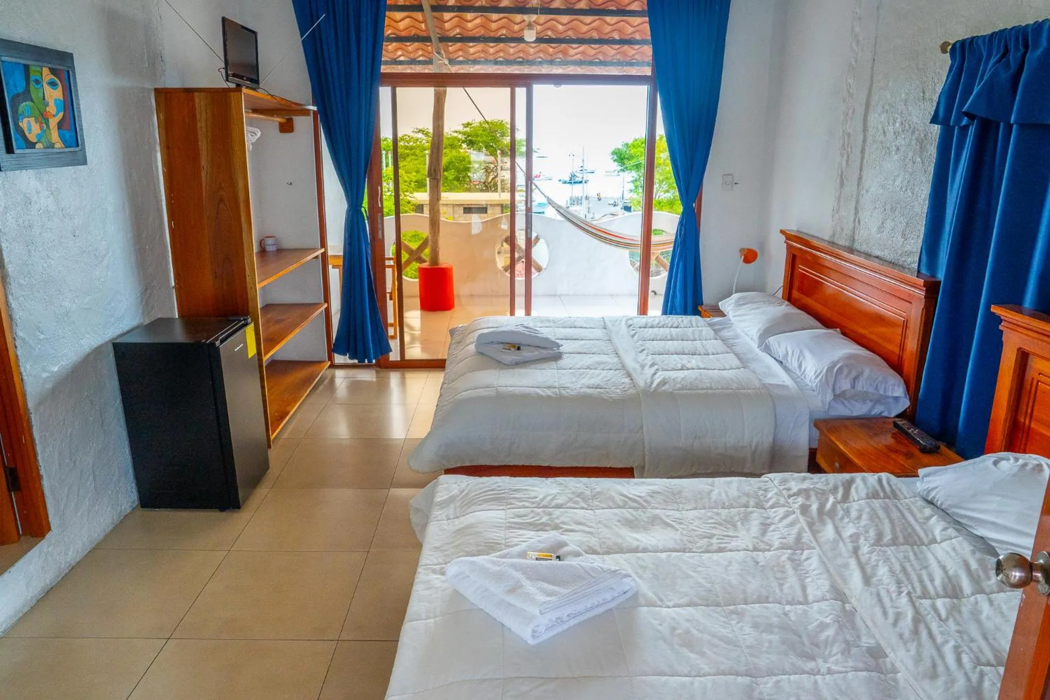 Bed in Royal Galápagos Inn