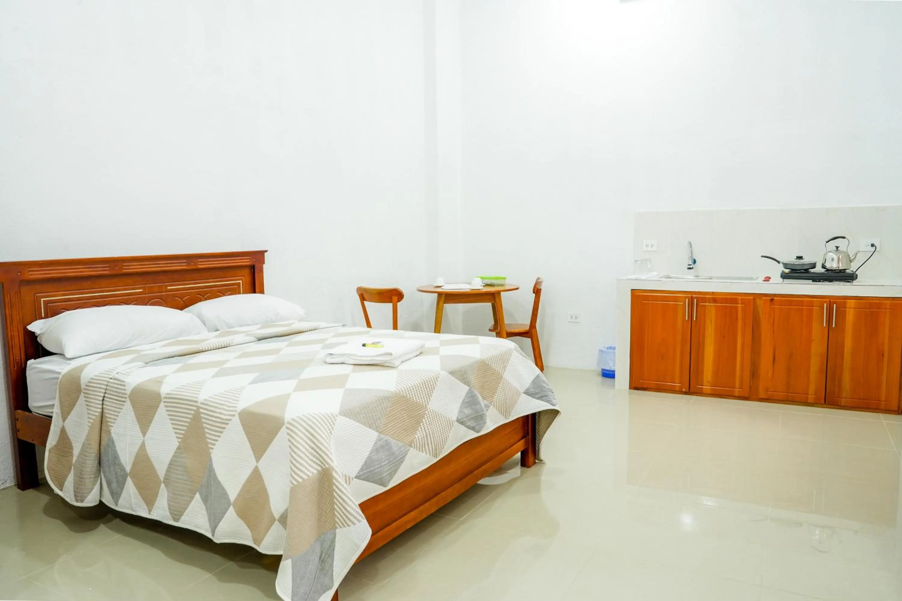 Bed in Royal Galápagos Inn