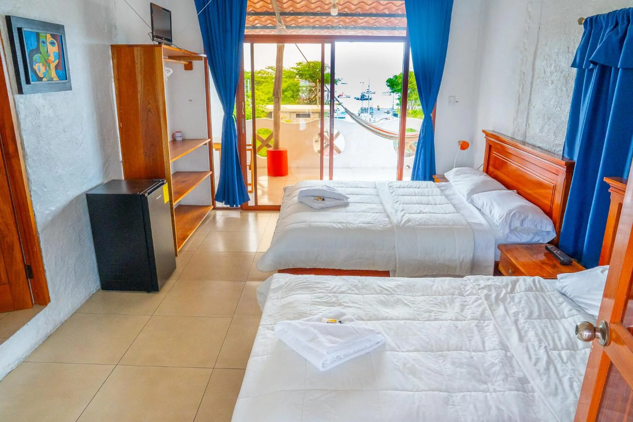 Bed in Royal Galápagos Inn