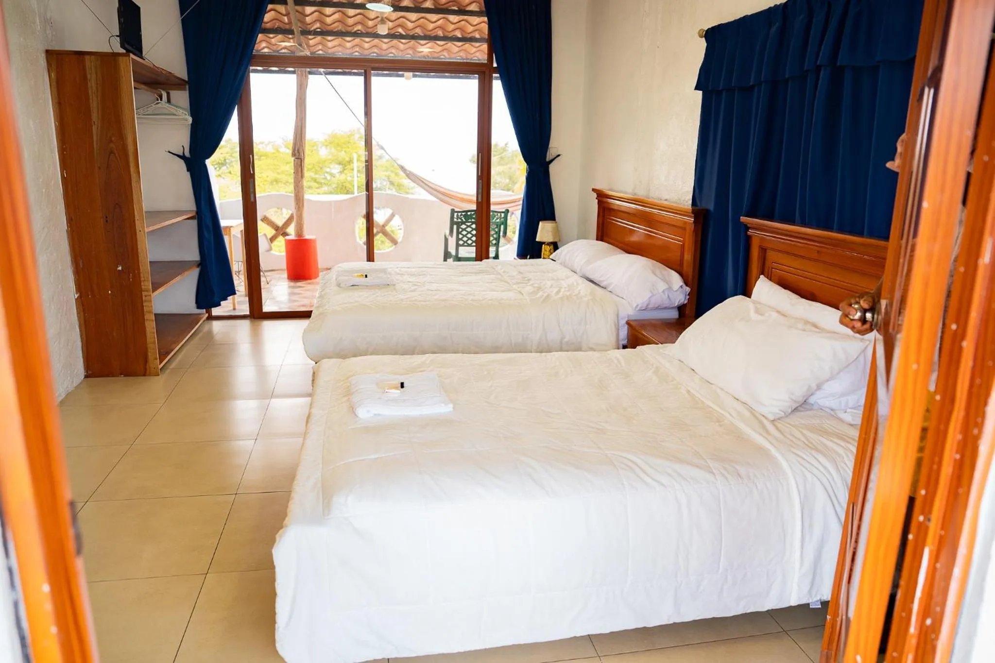 Bed in Royal Galápagos Inn