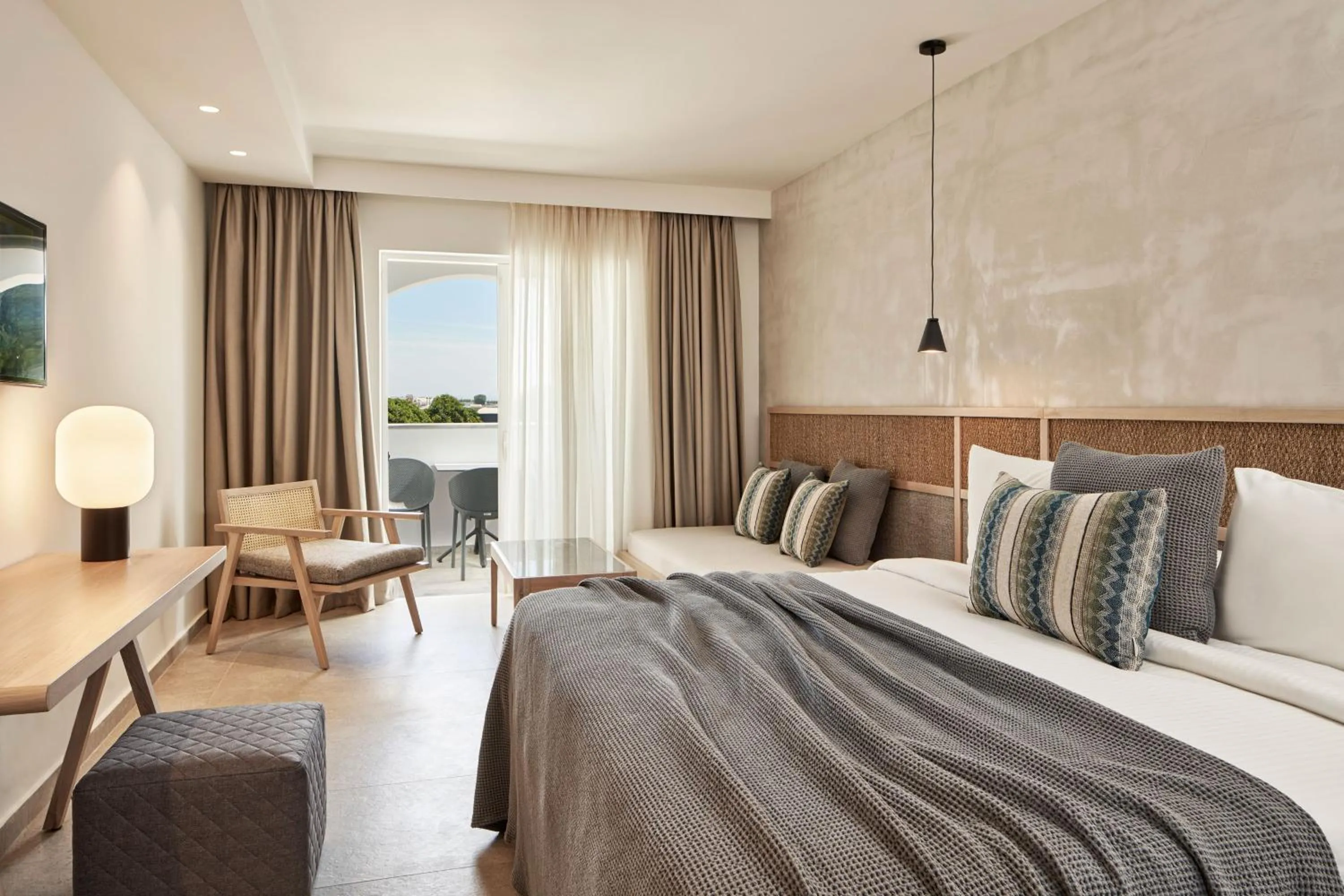 Bed in Atlantica Marmari Palace