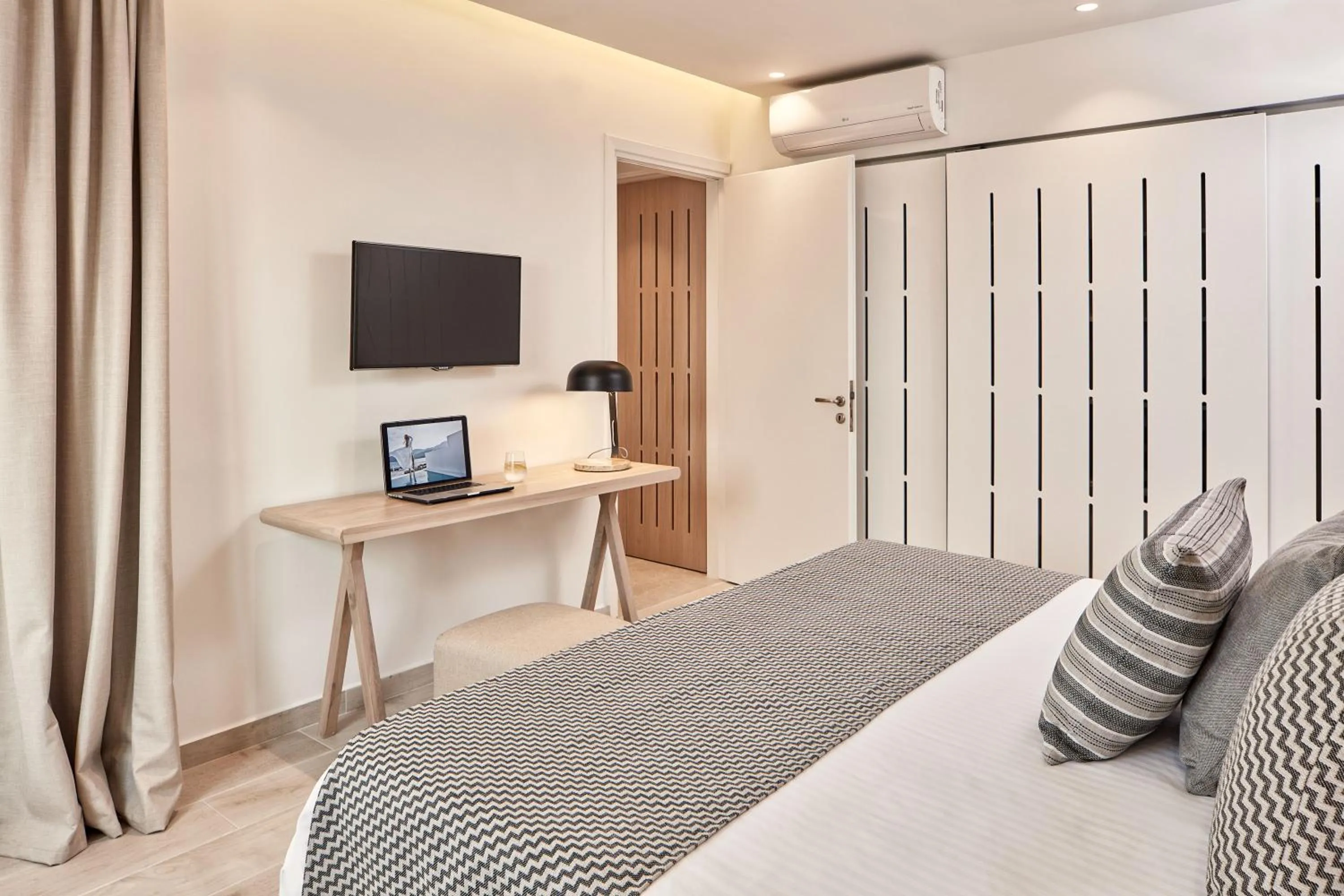 Bed in Atlantica Marmari Palace