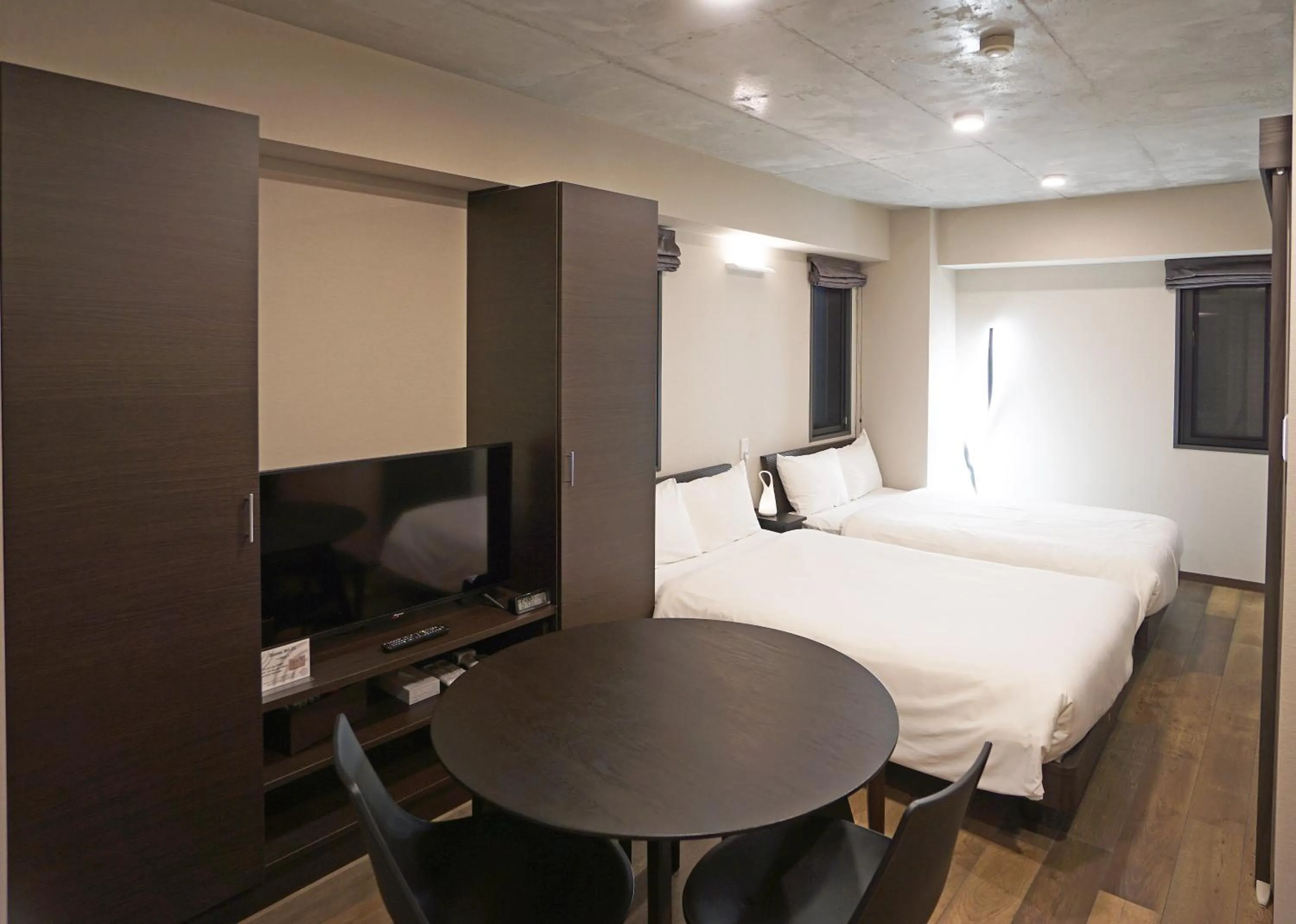 Living room, Bed in Prime Suites Tokyo