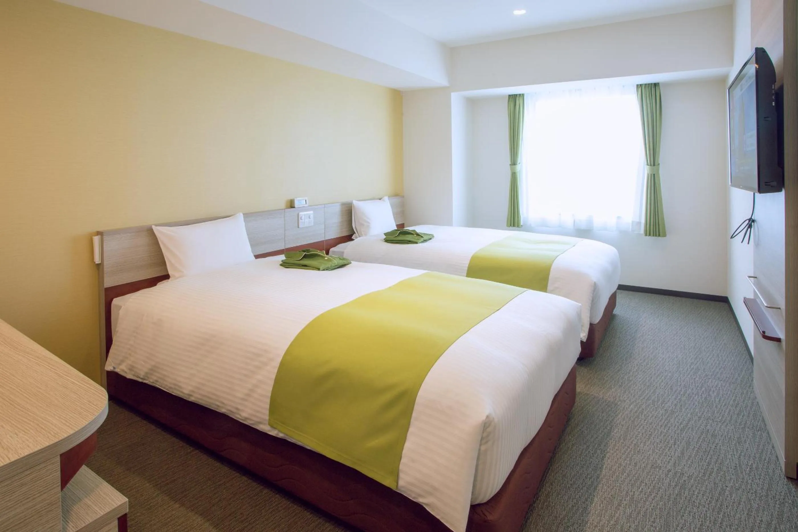 Bed in Kuretake Inn Premium Meieki minami