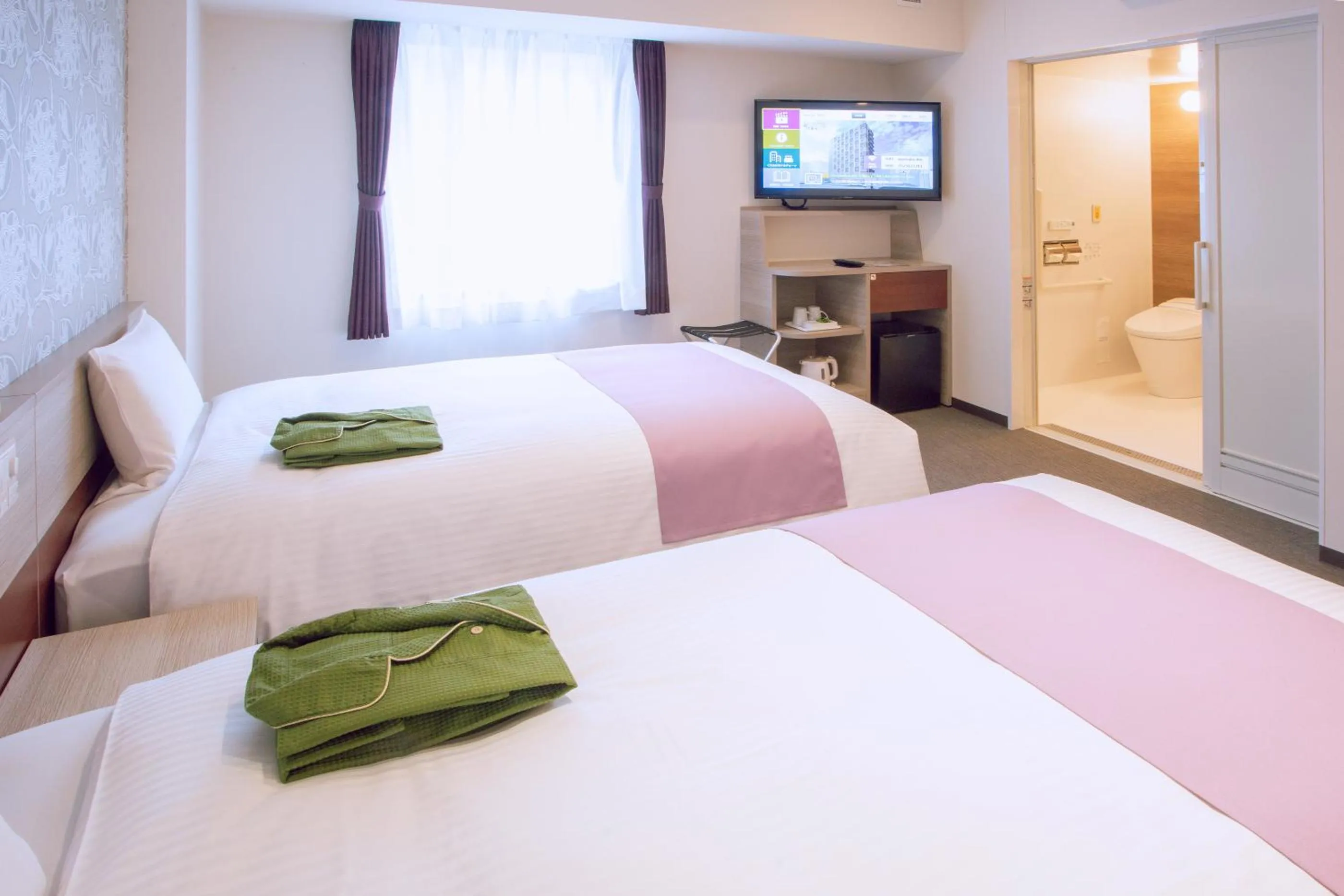 Bed in Kuretake Inn Premium Meieki minami