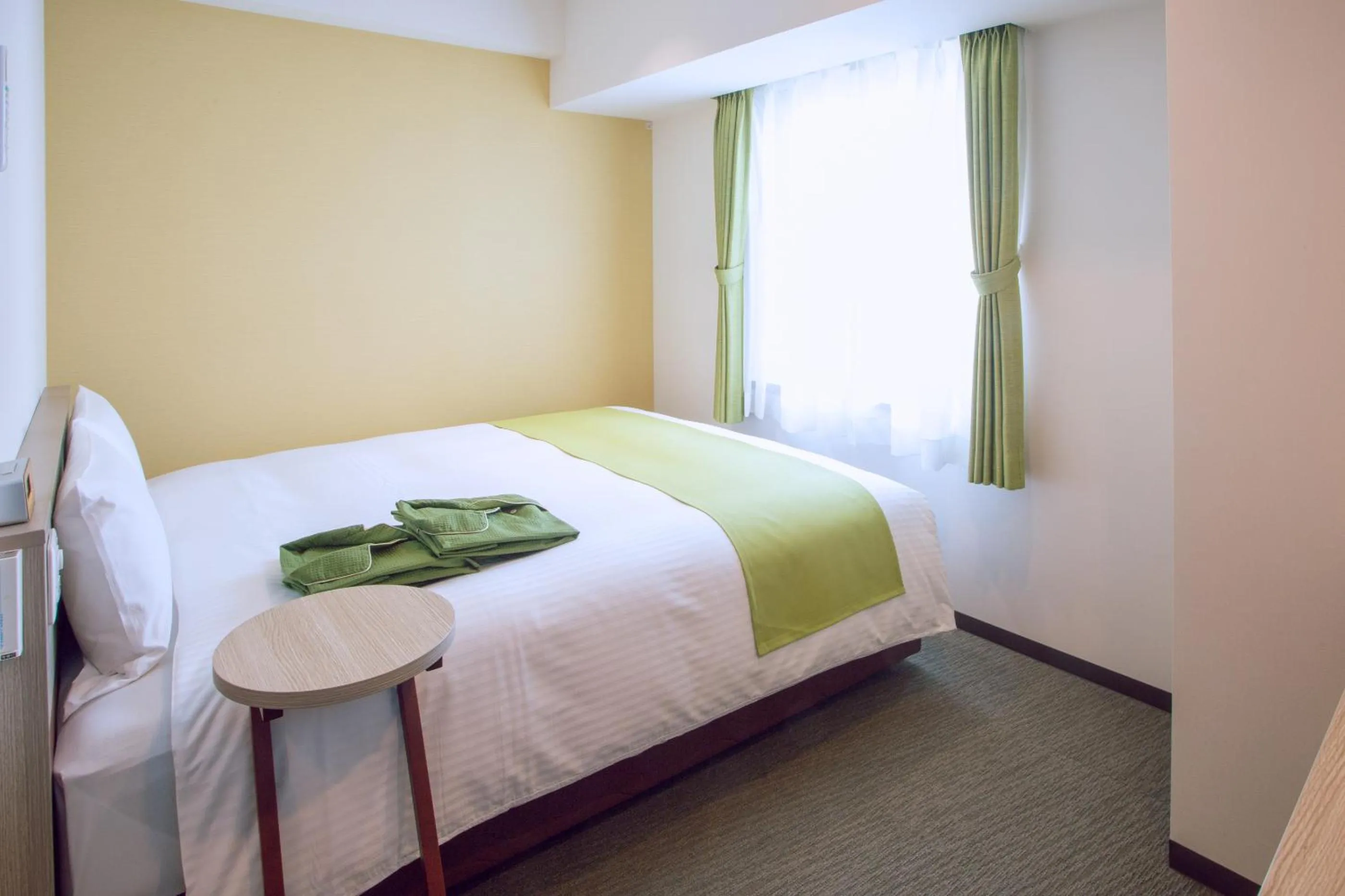 Bed in Kuretake Inn Premium Meieki minami