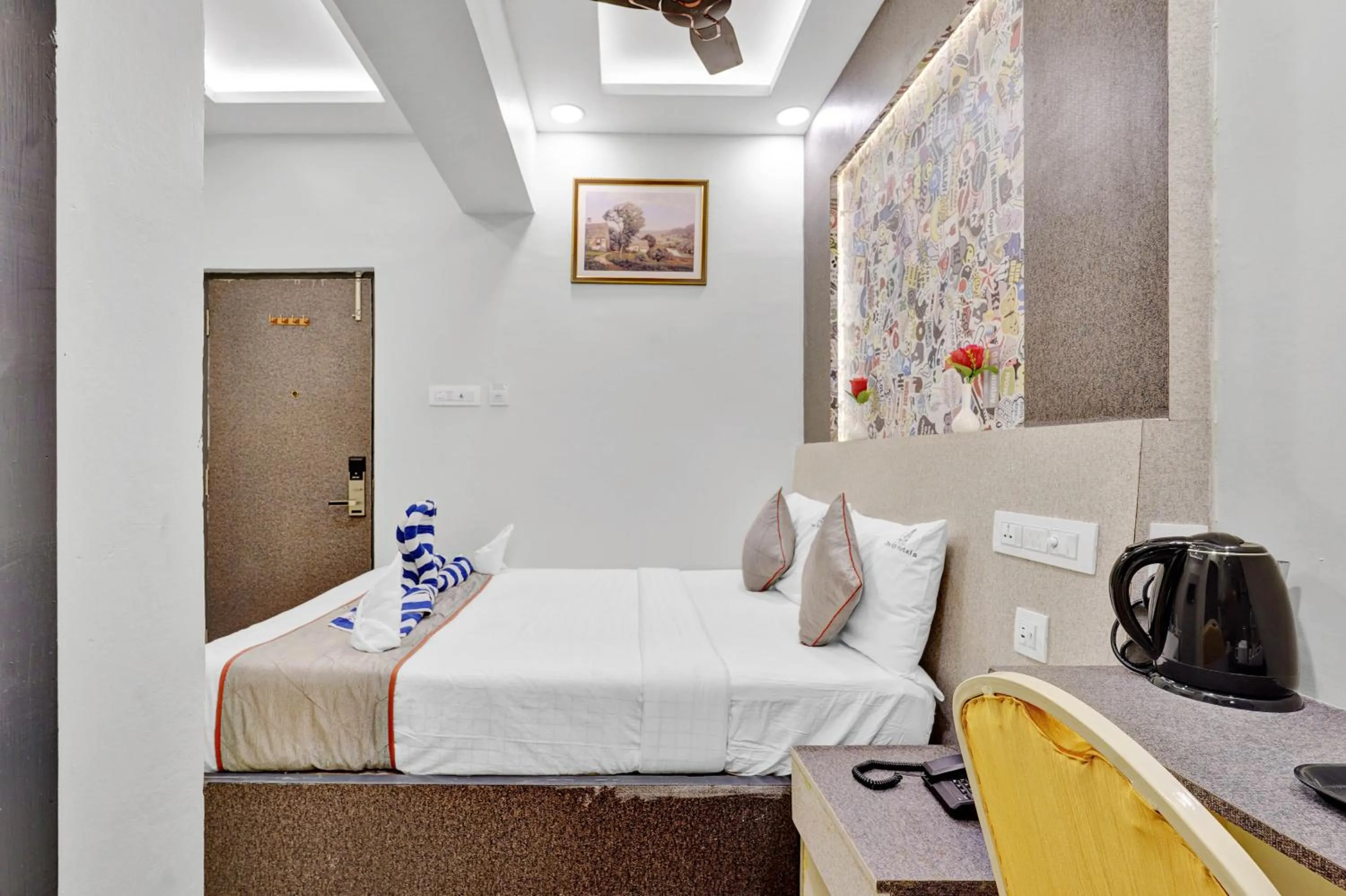 Seating area, Bed in The K11 Hotels - T Nagar