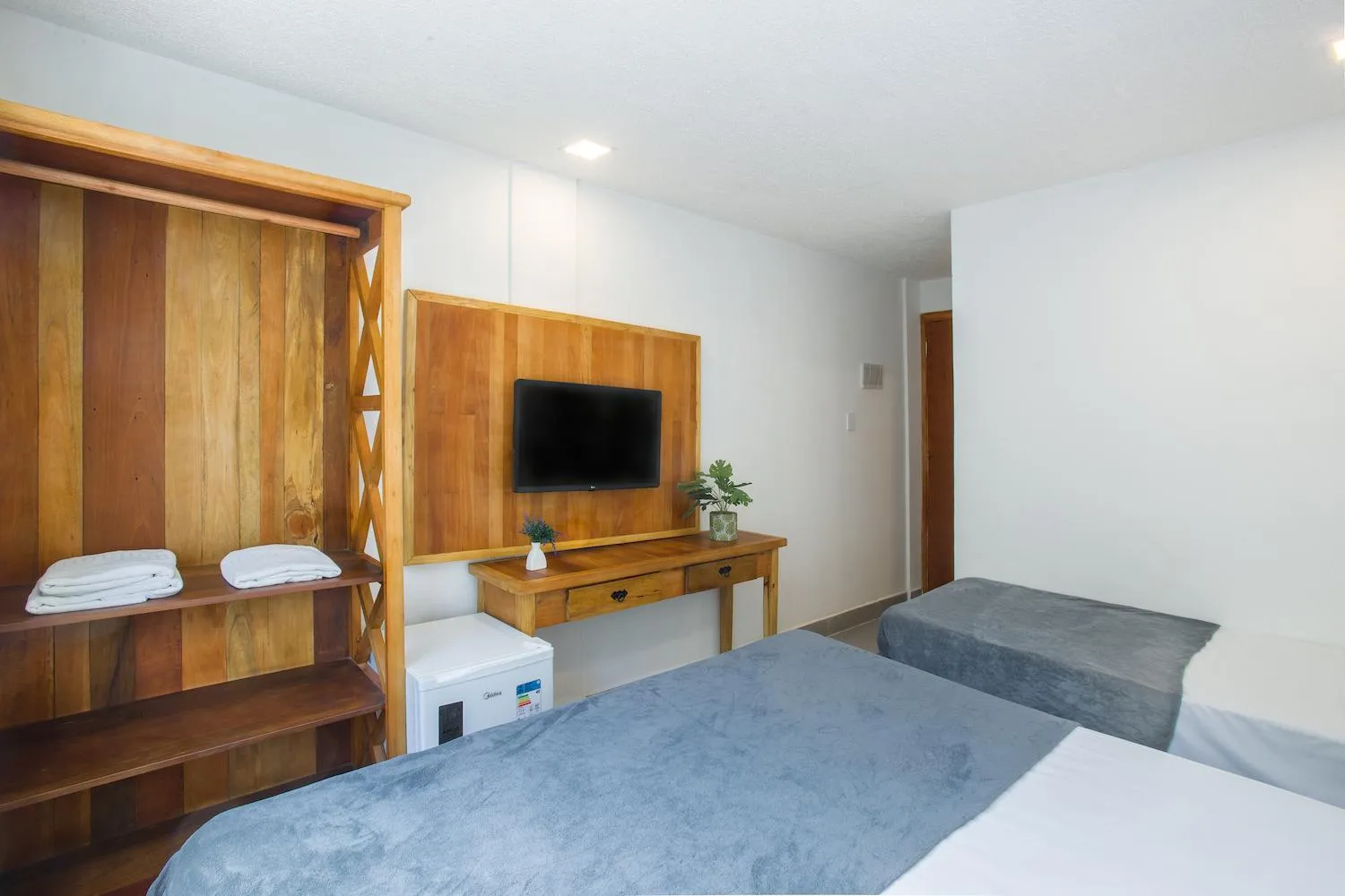 Bed in Hotel Cajueiro Guarujá