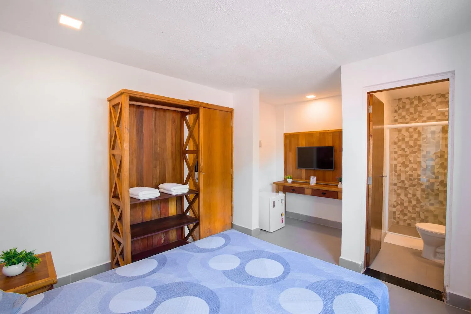 Bed in Hotel Cajueiro Guarujá