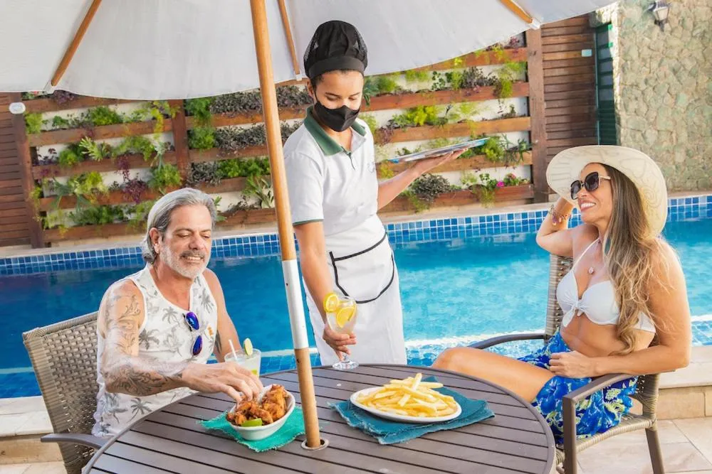 Swimming pool in Hotel Cajueiro Guarujá